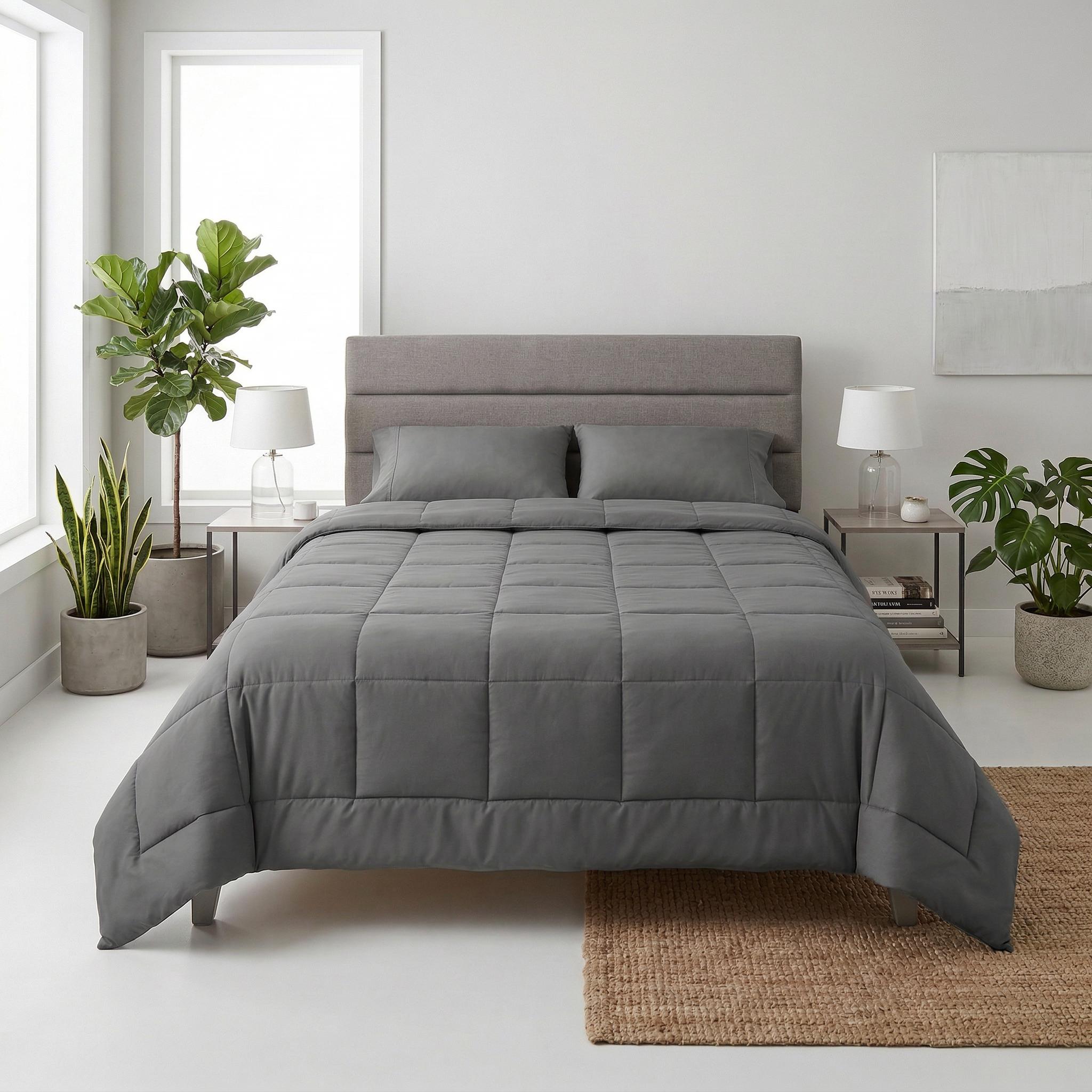 Gray Queen size microfiber comforter with box stitching on a bed.