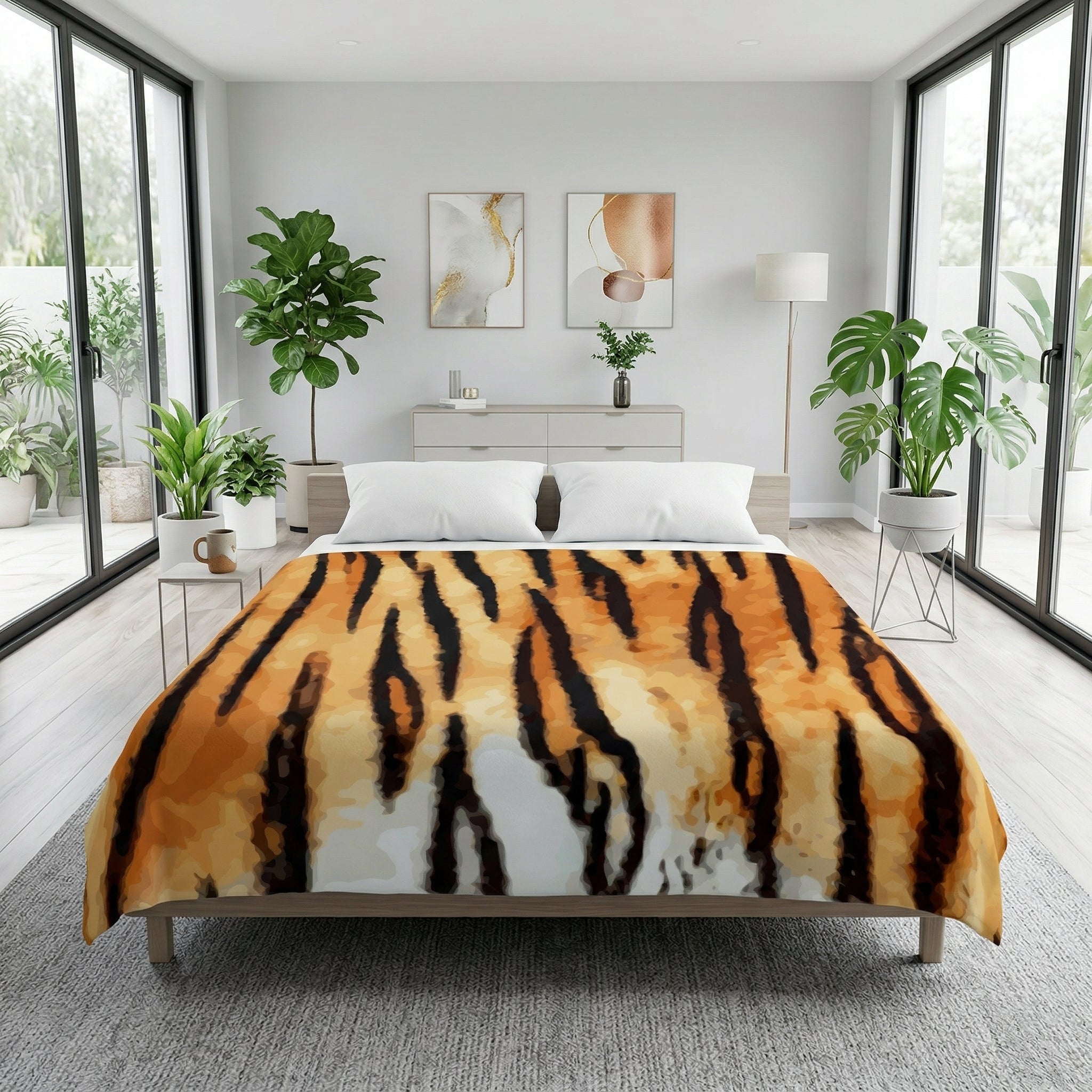 Orange and black tiger print flannel blanket on a bed in a bright, modern bedroom.