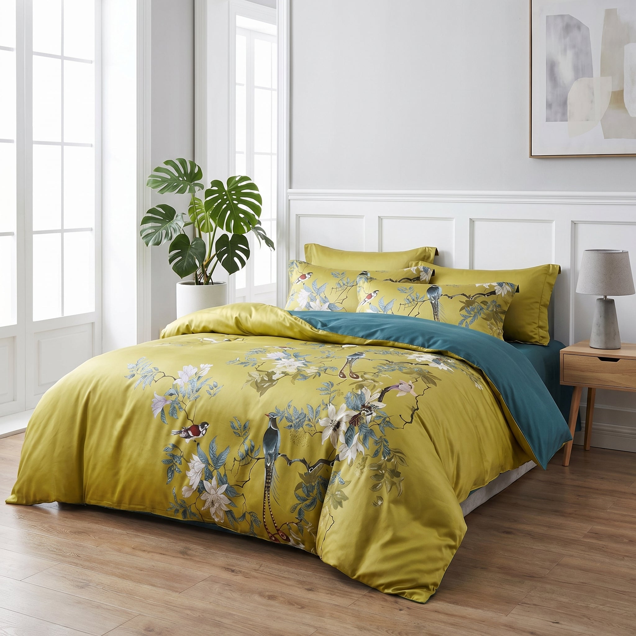 Aurelia Aviary cotton sateen bedding set with golden floral and bird design, deep teal reverse.