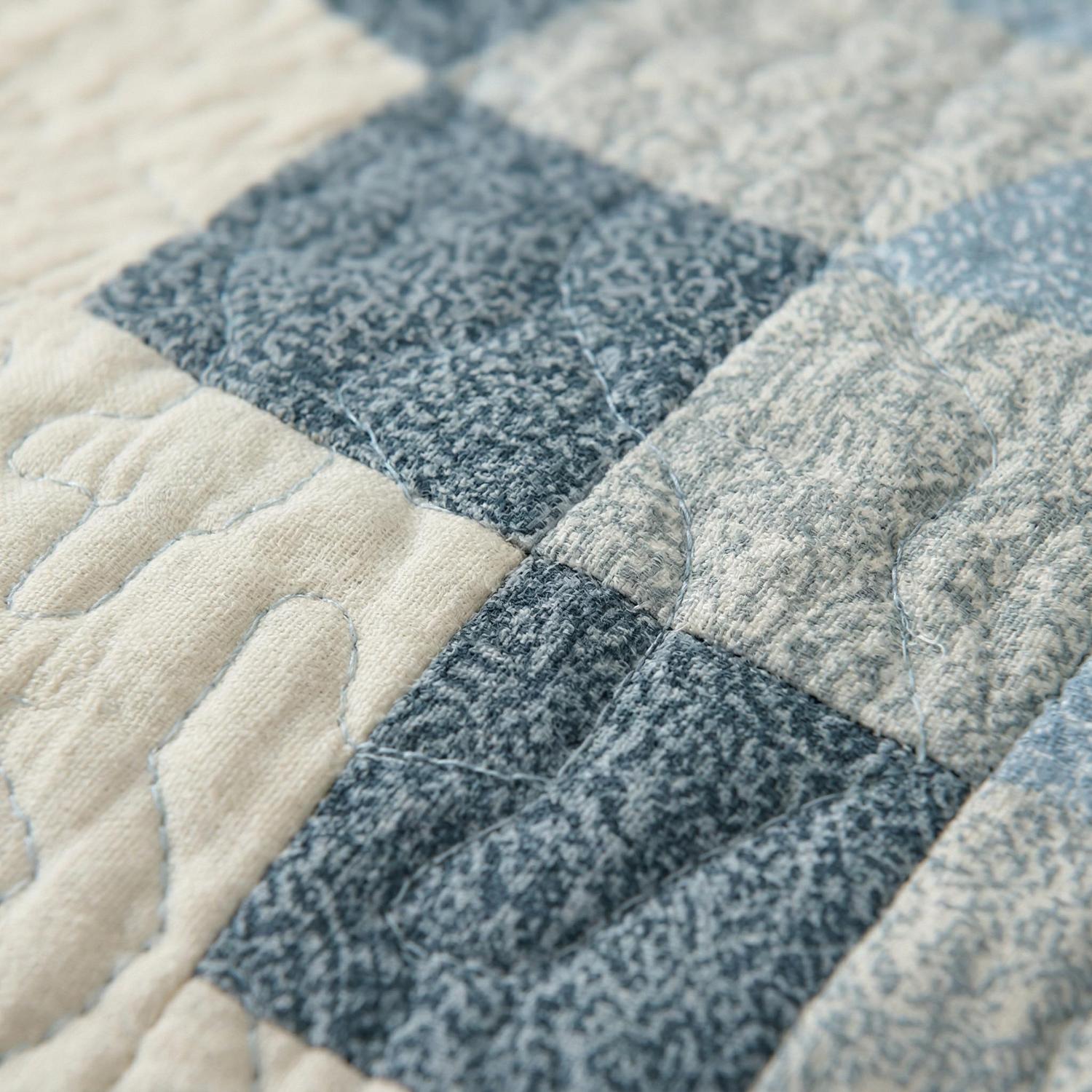 Blue Sun Printed Quilt Set with elegant floral design, polyester material, and two pillowcases.