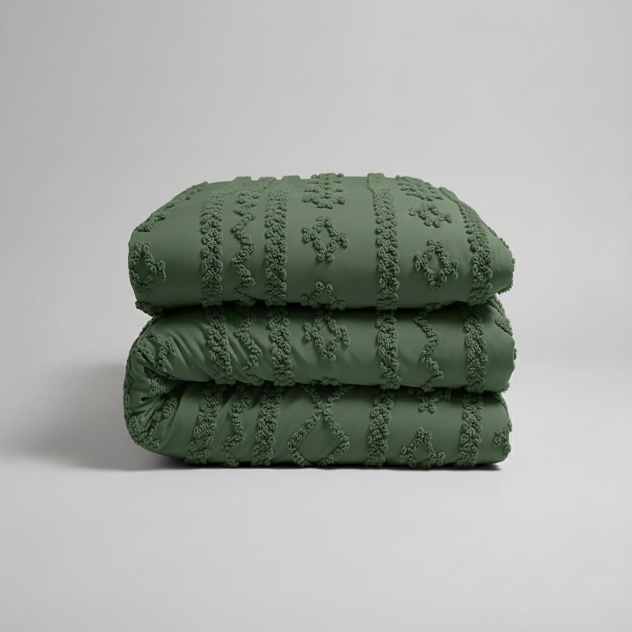 Queen size Boho Comforter Set in soft tufted olive green cotton polyester, folded.