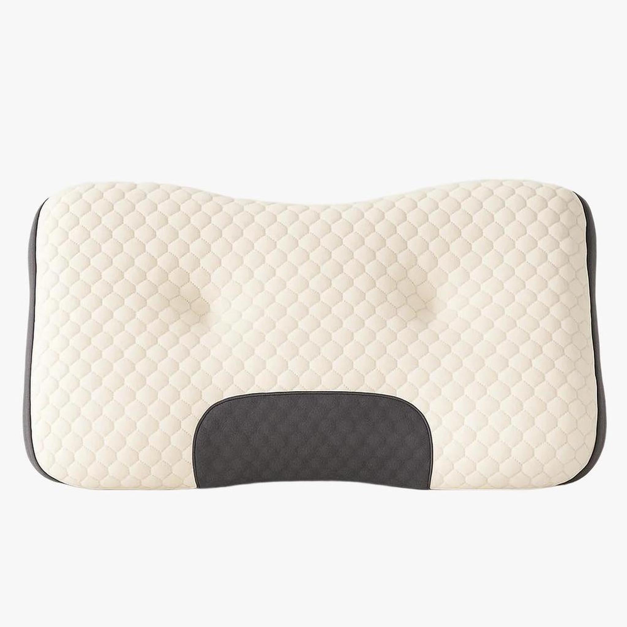 Cream quilted soybean fiber cervical support pillow with dark grey trim and neck contour.