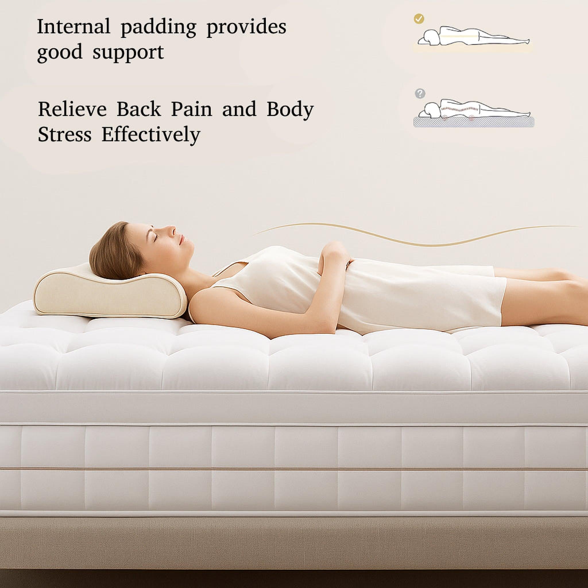 Woman sleeping peacefully on a white quilted mattress topper with a cream pillow, illustrating back pain relief.