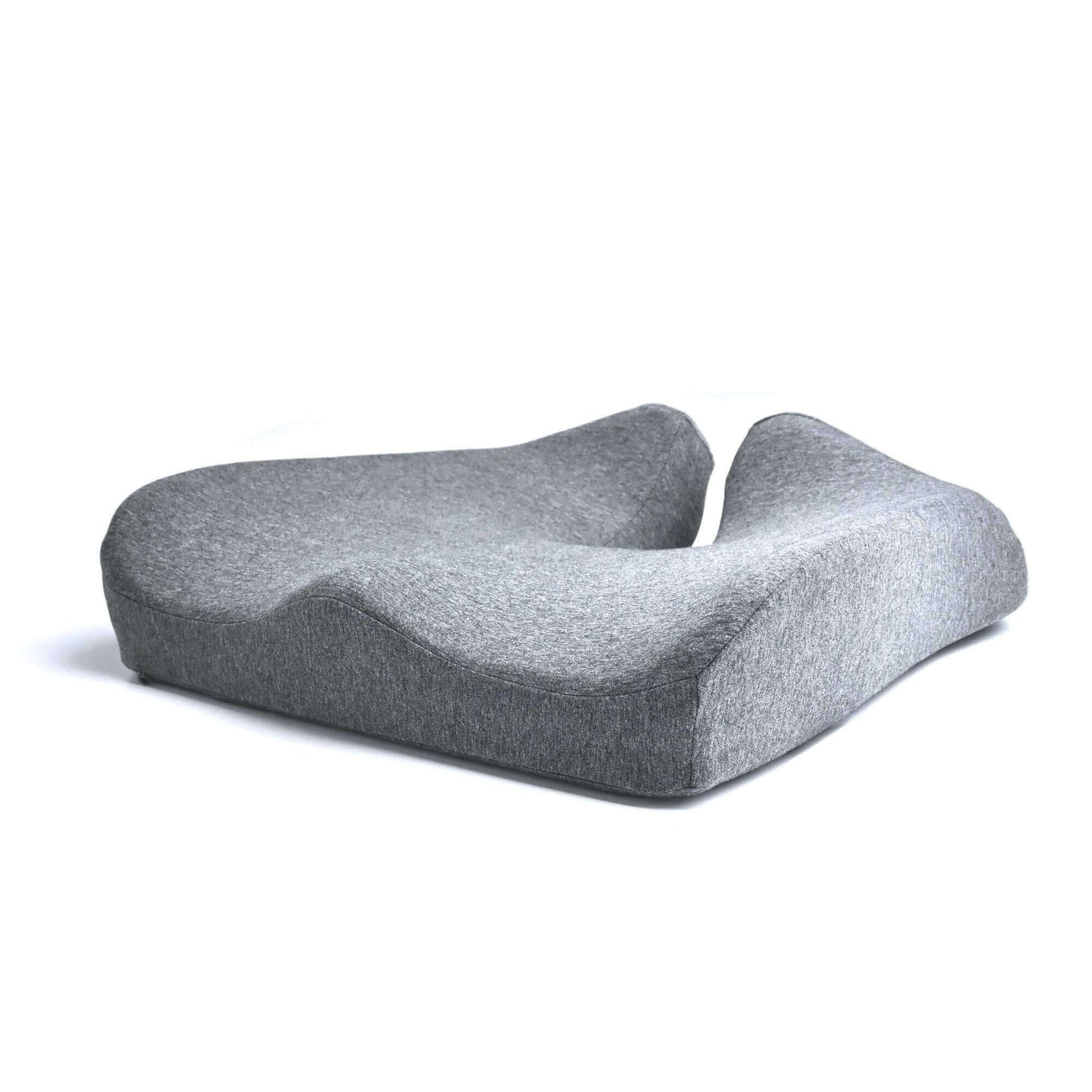 Ergonomic gray foam seat cushion with contoured design for back and posture support.