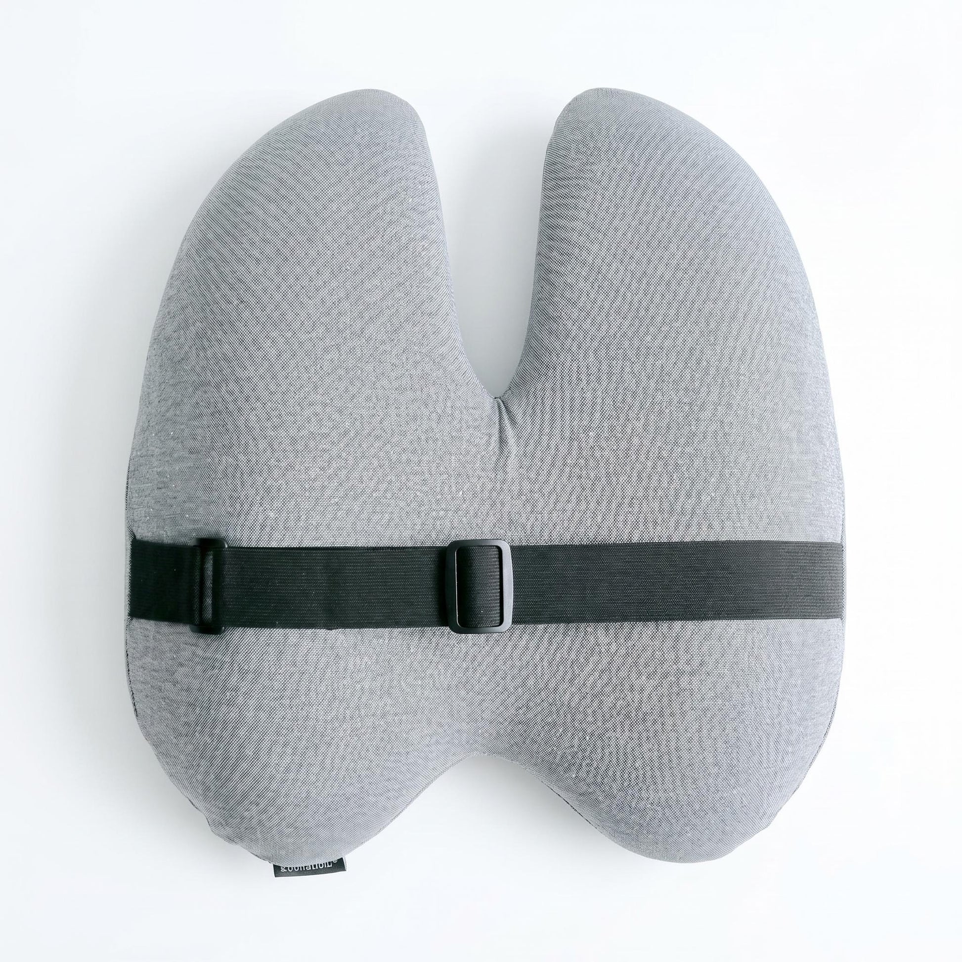 Gray ergonomic back support cushion with a black adjustable strap and buckle.