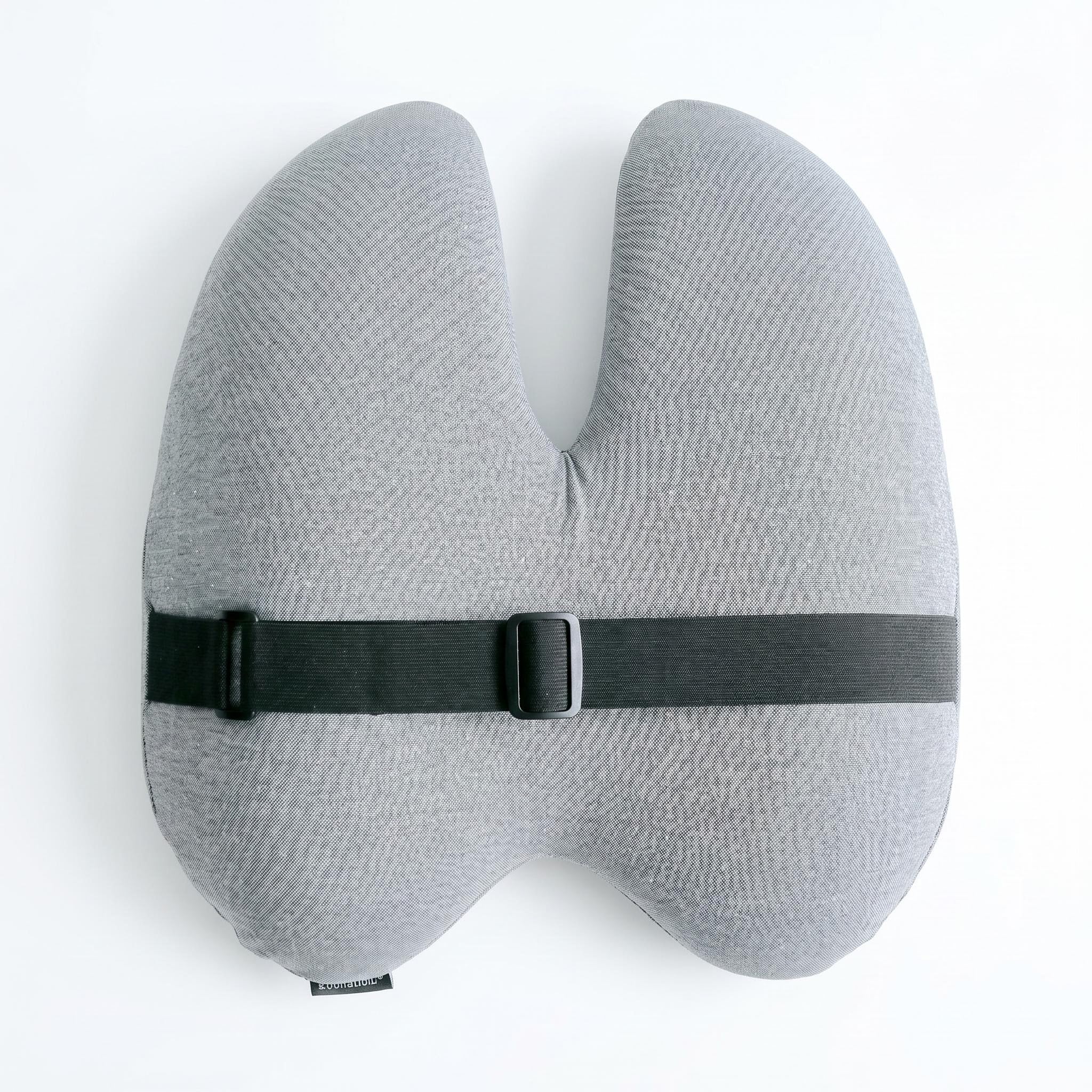 Gray ergonomic back support cushion with a black adjustable strap and buckle.