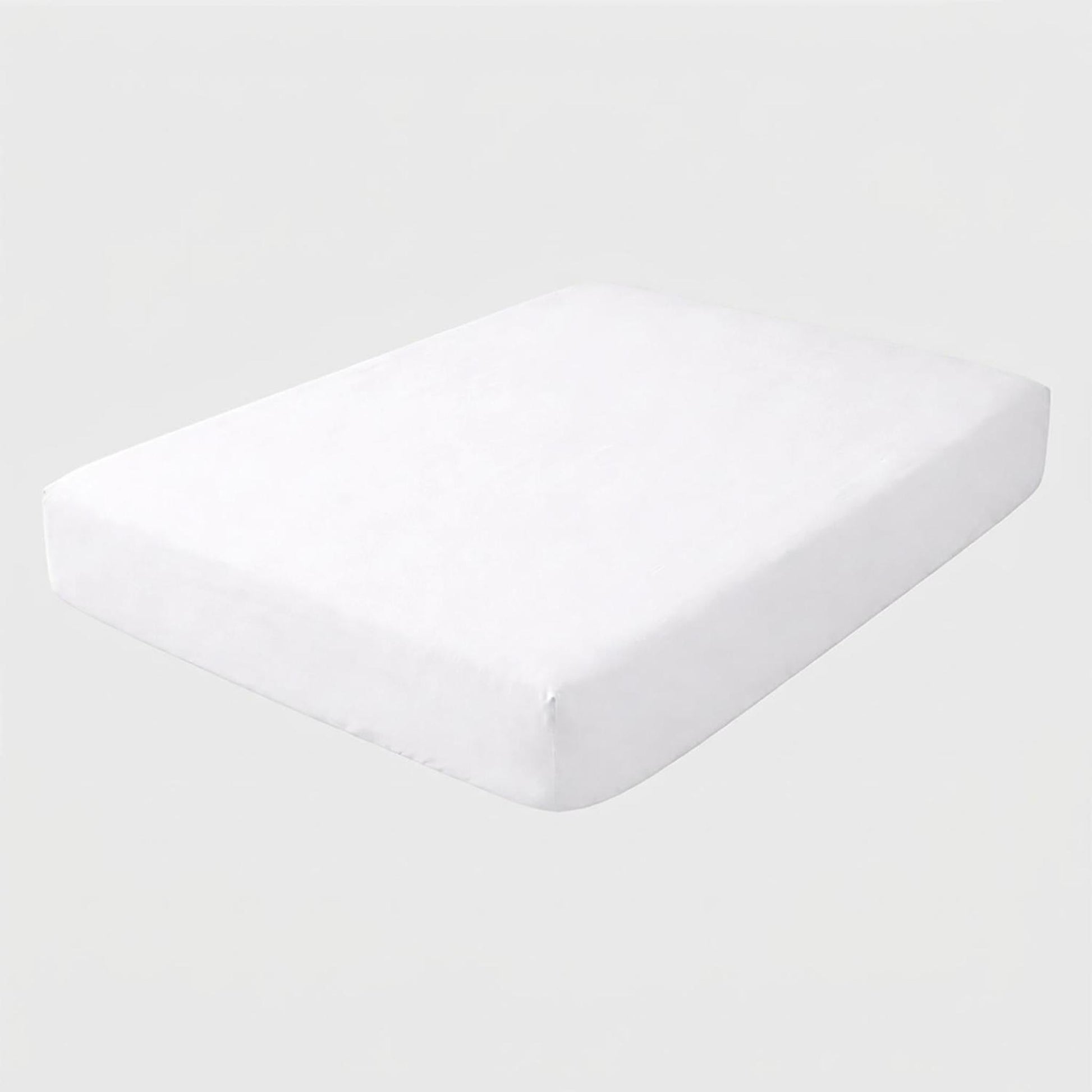 White 100% cotton fitted sheet for a Twin XL mattress, showing its smooth, breathable fabric.
