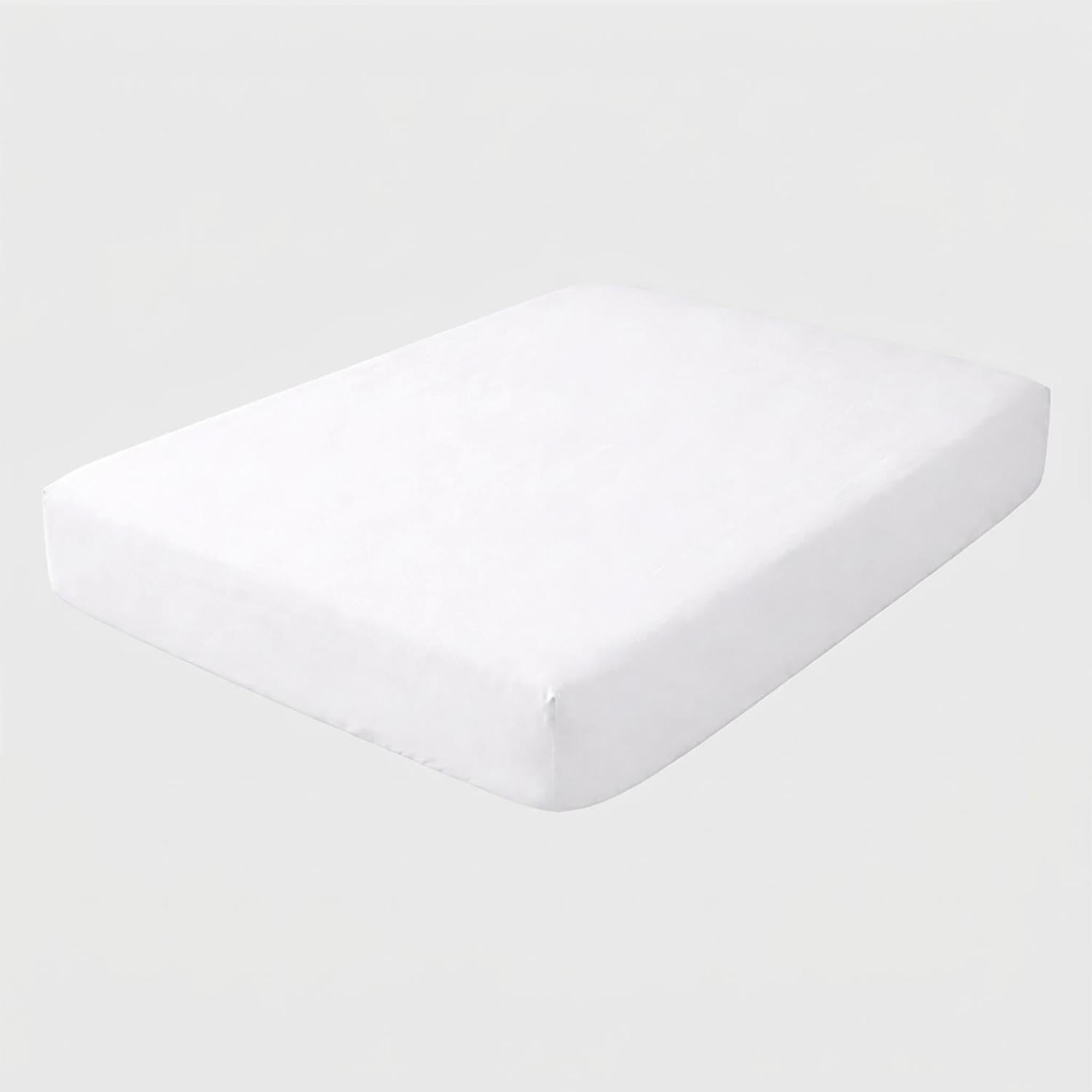 White 100% cotton fitted sheet for a Twin XL mattress, showing its smooth, breathable fabric.