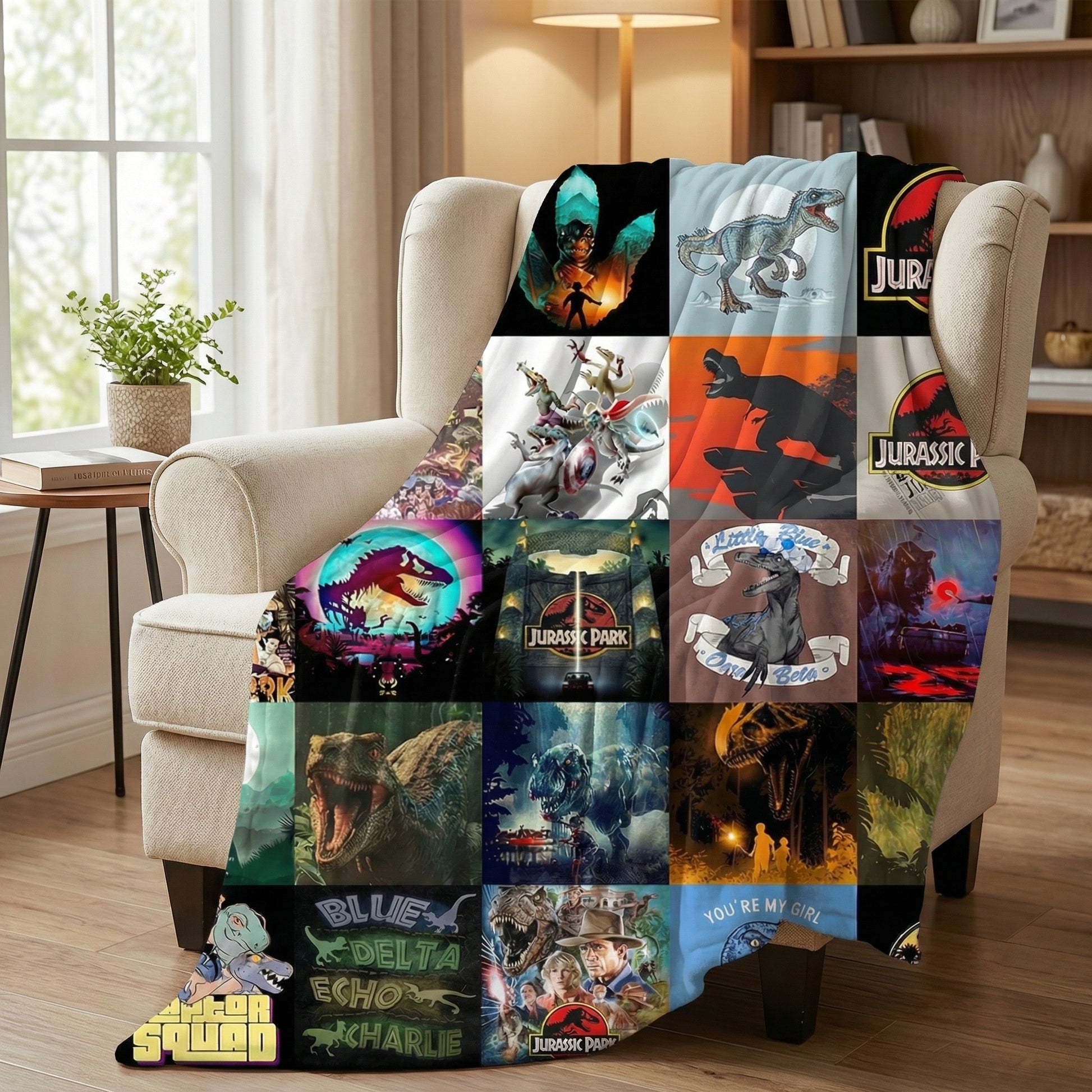 Vibrant Jurassic Park dinosaur fleece throw blanket draped over a cream armchair, featuring various movie scenes and logos.