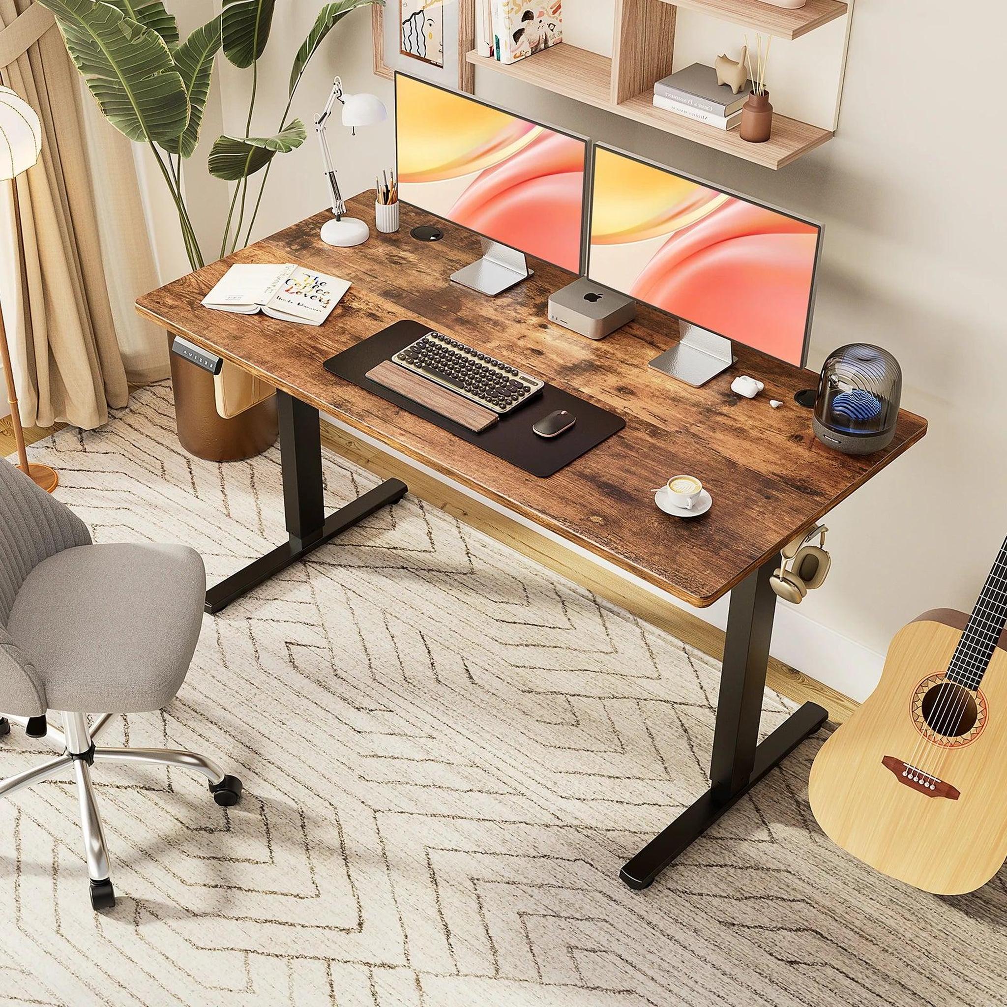 Electric adjustable standing desk with rustic brown wooden top and black T-shaped legs.