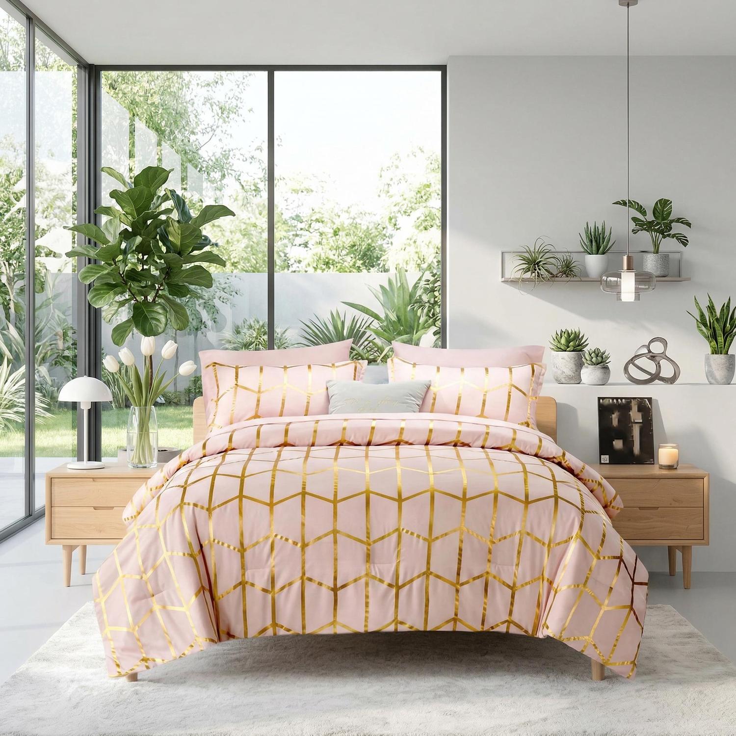 Pink microfiber comforter set with gold foil geometric pattern, two shams, and decorative pillows.