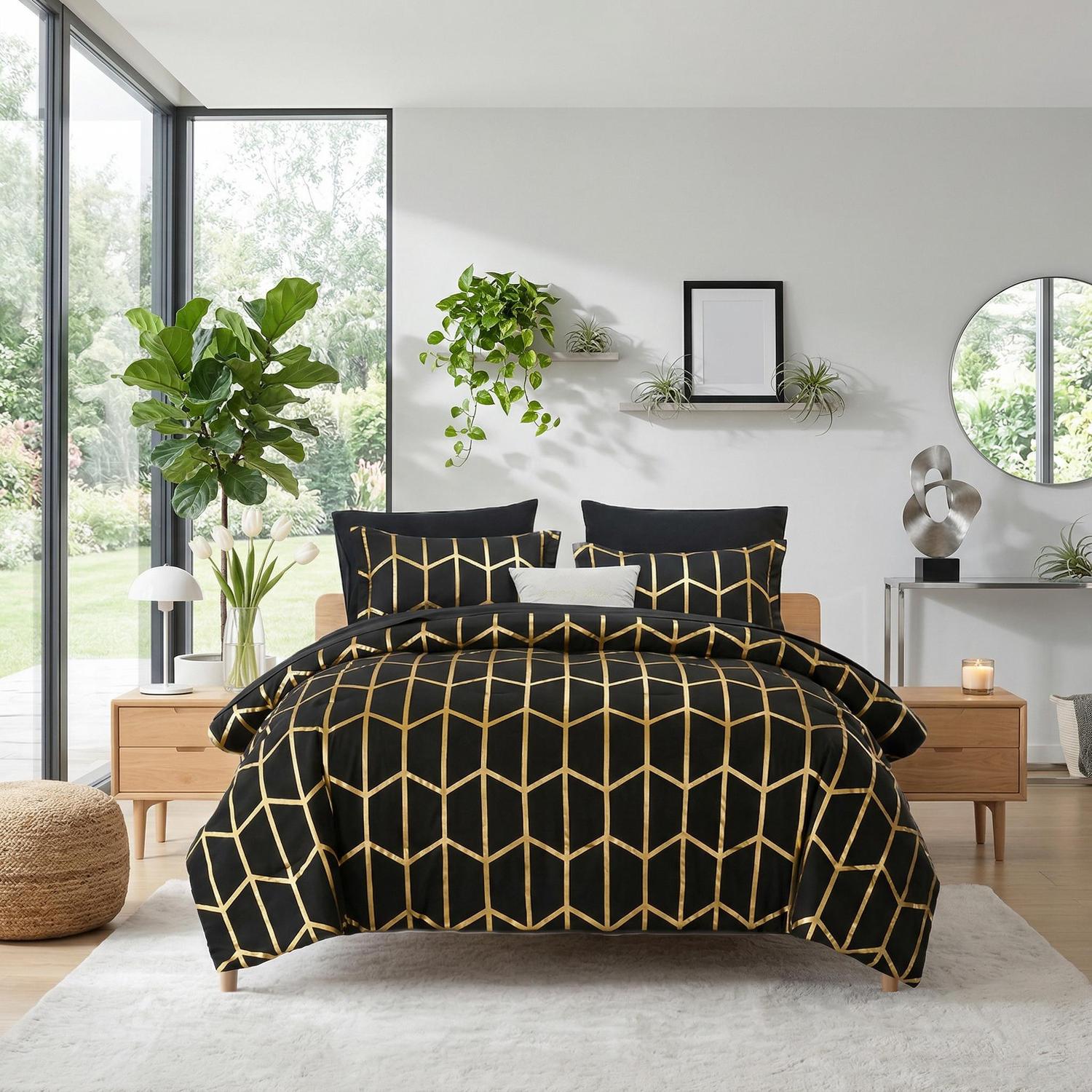 Elegant black comforter set with gold geometric foil design, two shams, and decorative pillows.