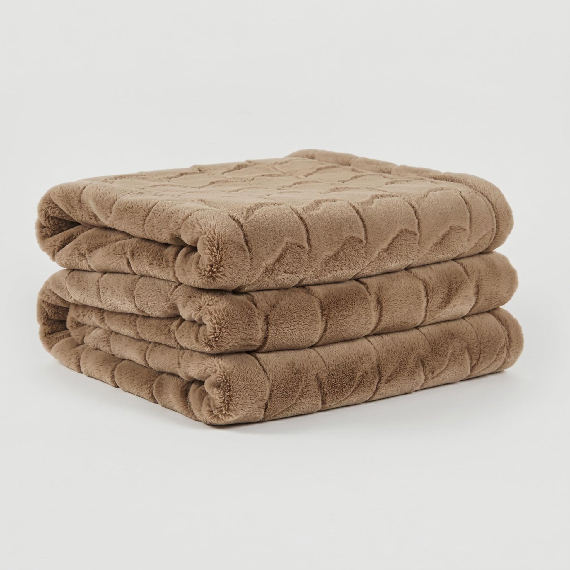 Soft brown faux fur throw blanket, folded and stacked, featuring a subtle textured tatting design.