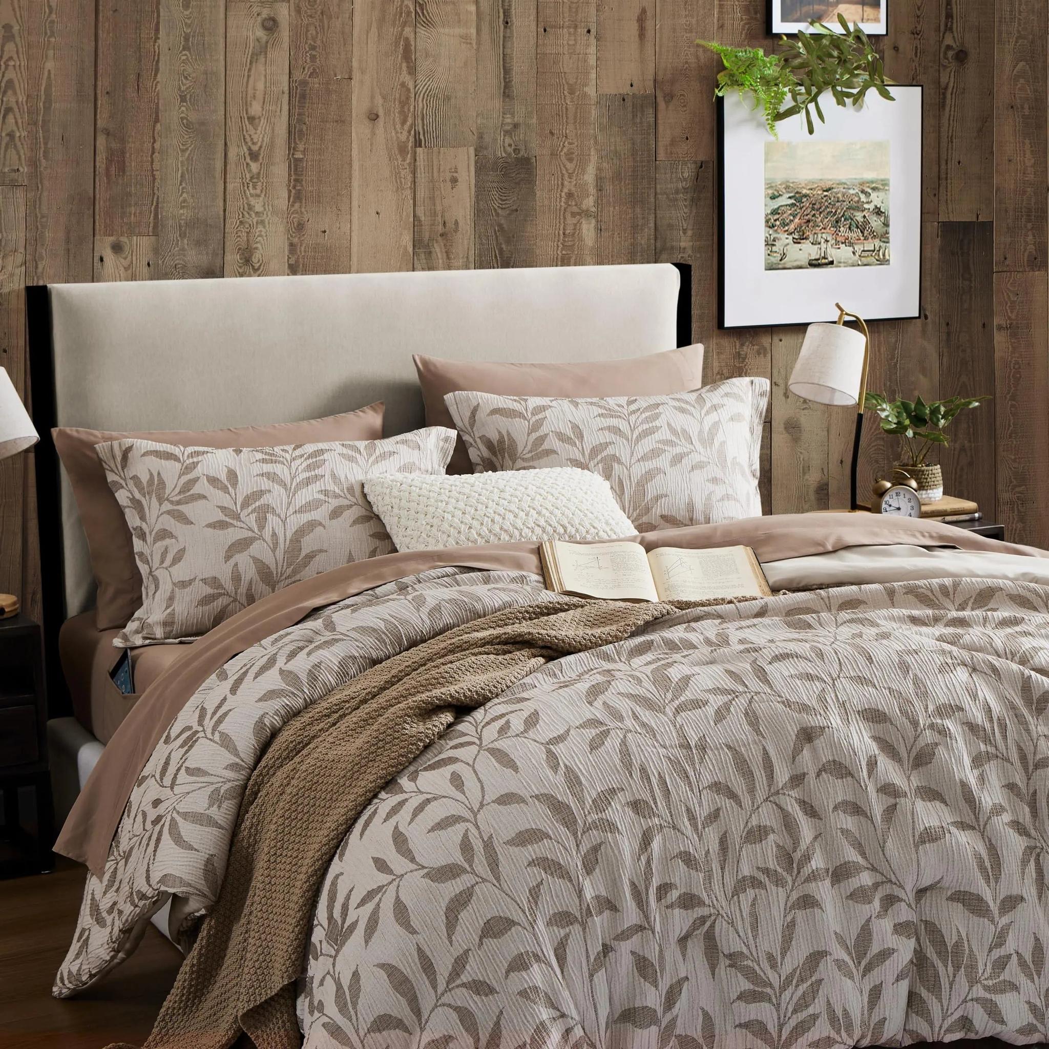 Elegant floral duvet cover set in soft botanical pattern, microfiber fabric, with matching pillowcases.