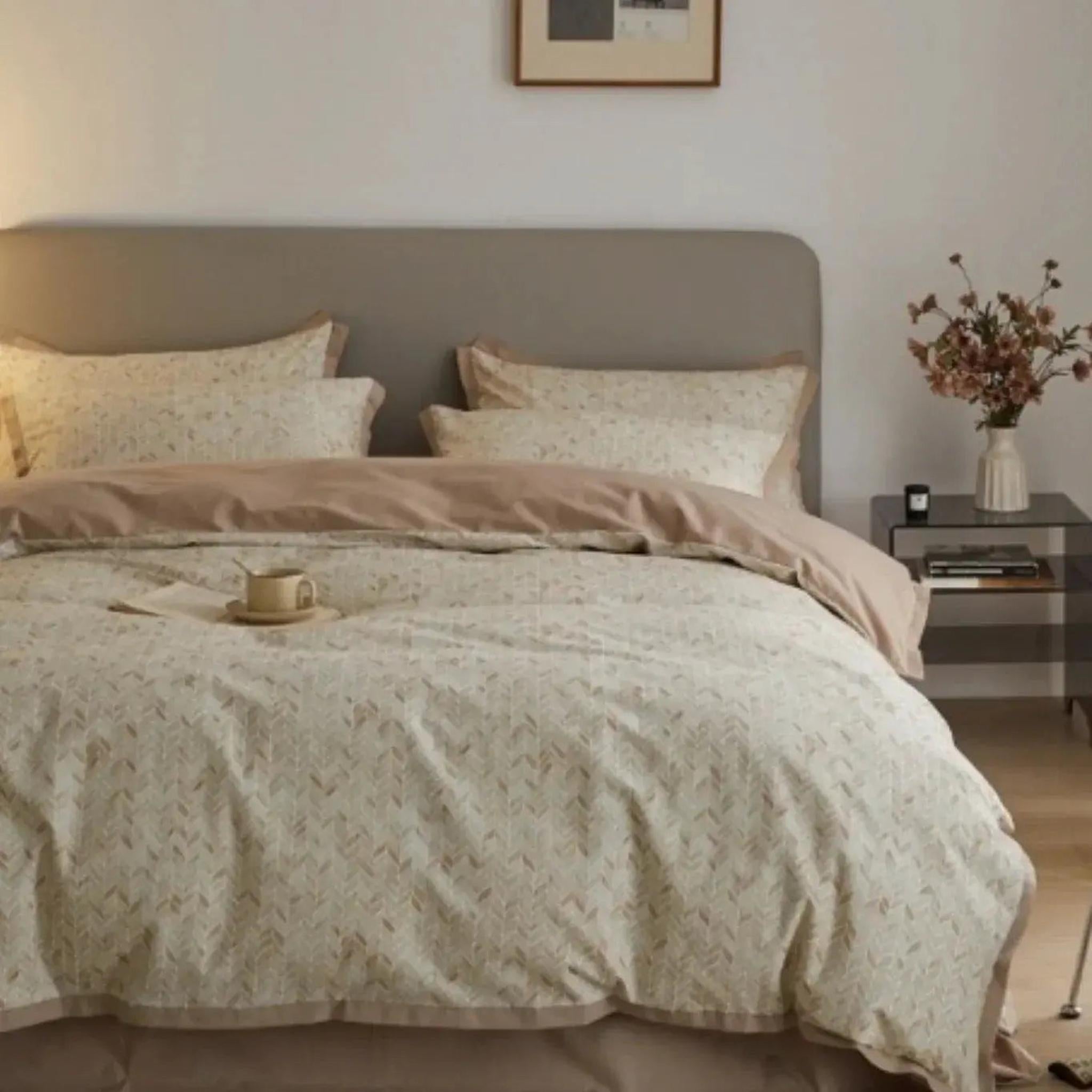 Elegant floral duvet cover set in soft beige microfiber with a subtle botanical pattern, styled on a bed.