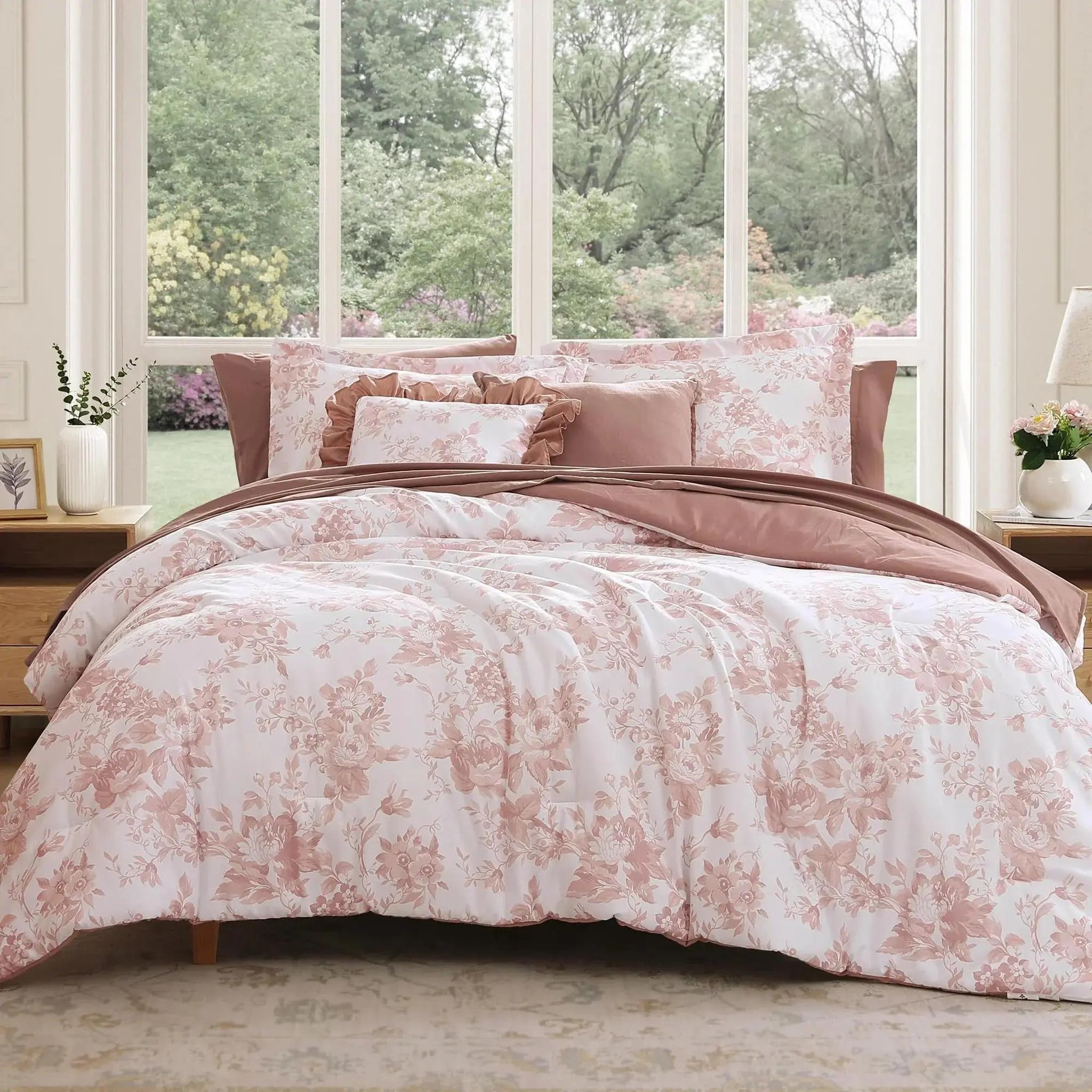 Elegant white microfiber duvet cover with soft pink floral pattern and solid pink reverse.