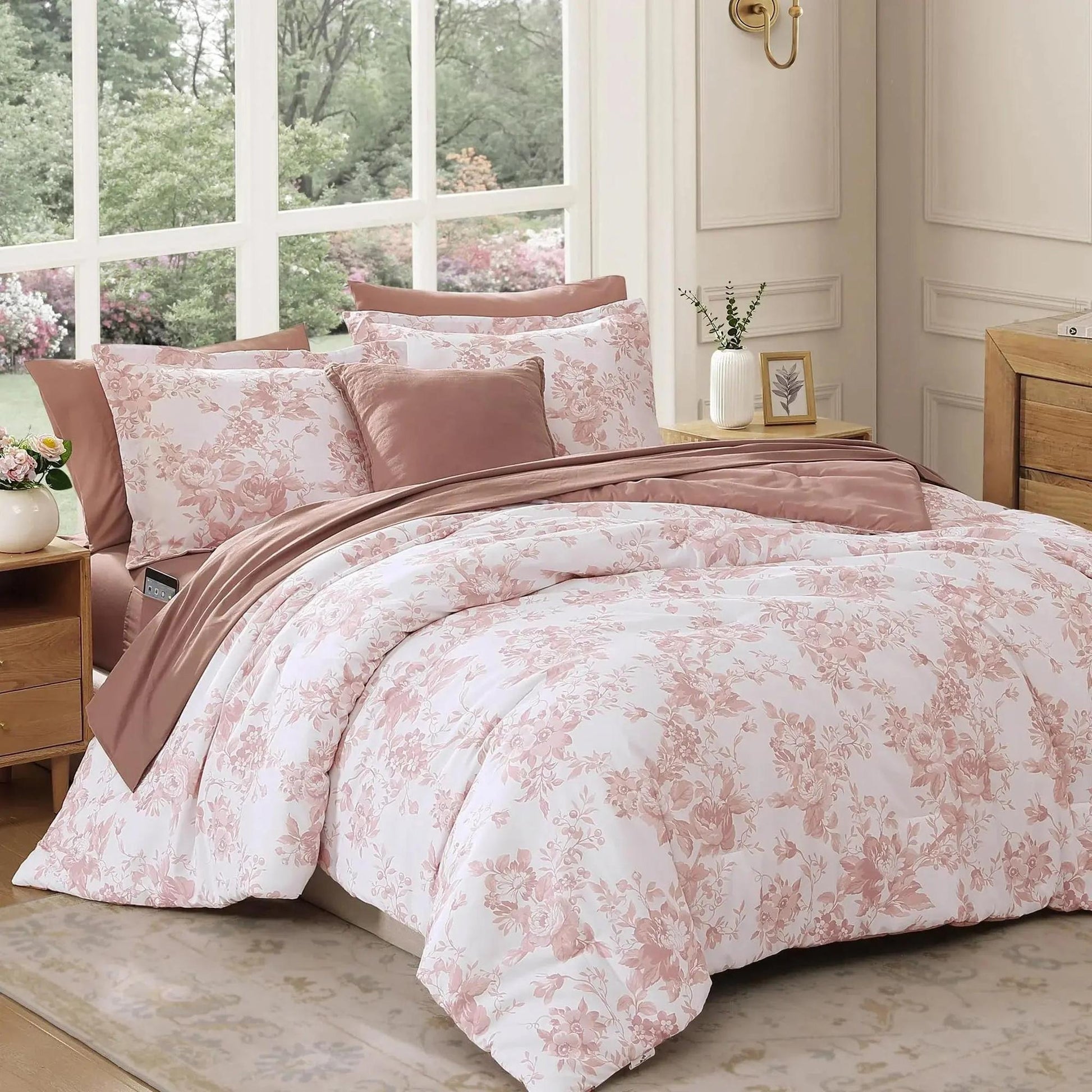 Elegant floral duvet cover set with pink botanical print on white microfiber, styled on a bed.