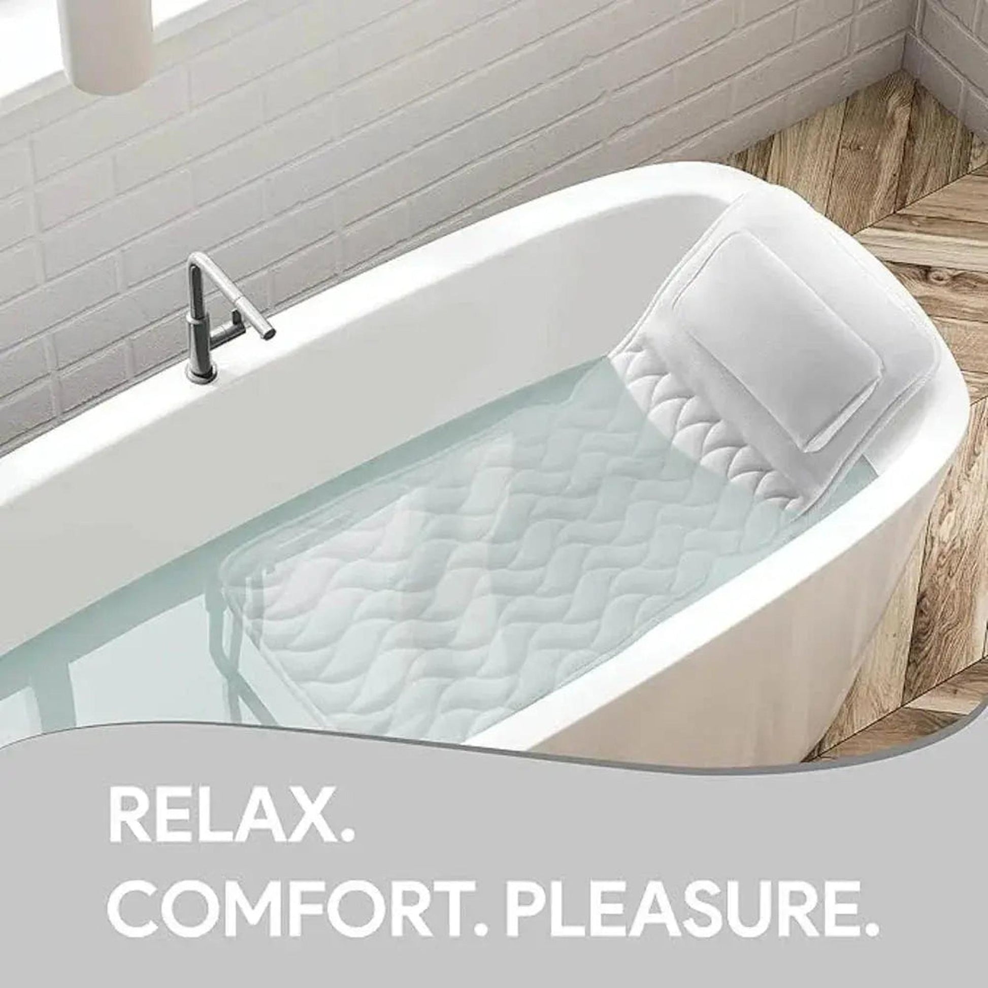 White full body bath pillow with headrest in a modern bathtub filled with water.