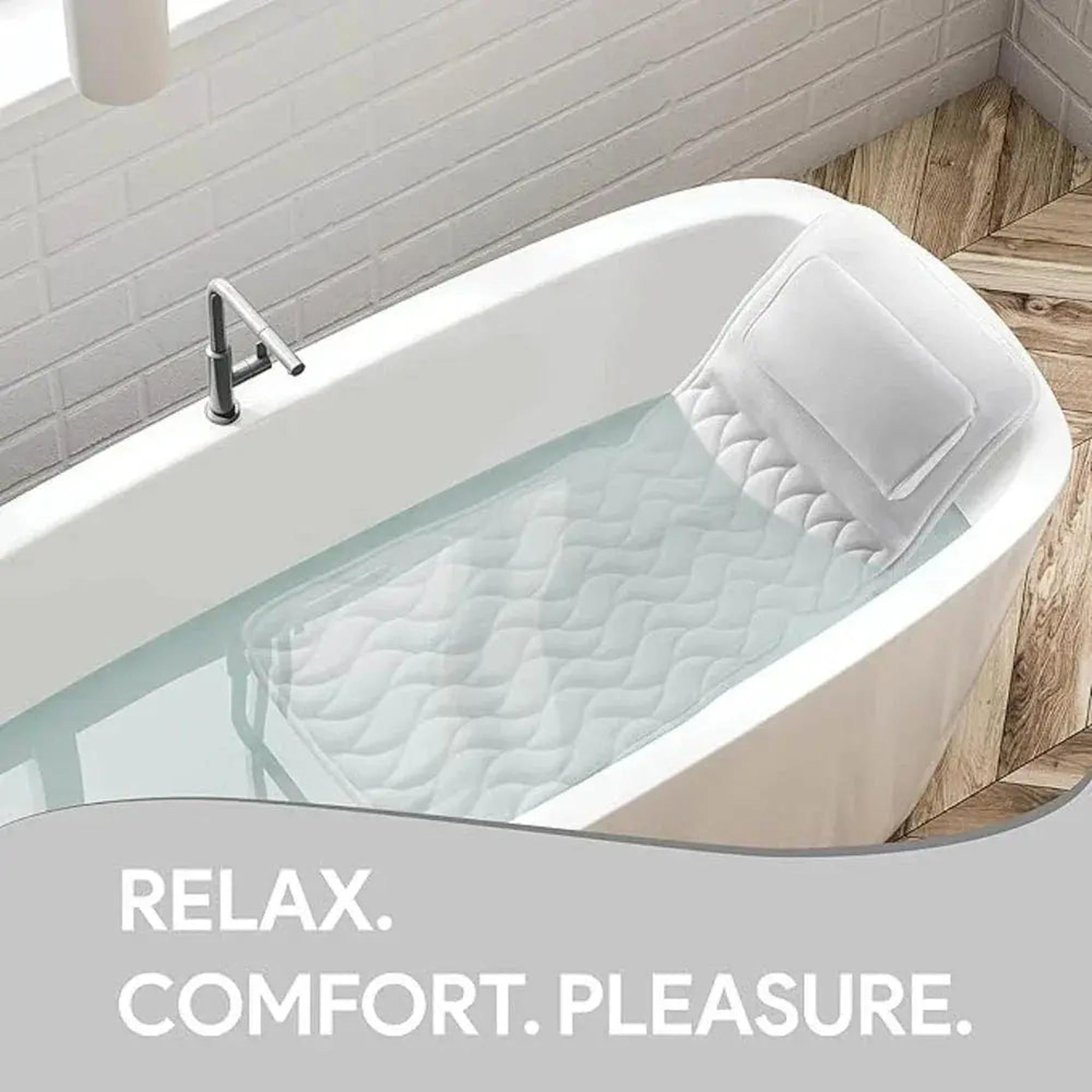 White full body bath pillow with headrest in a modern bathtub filled with water.