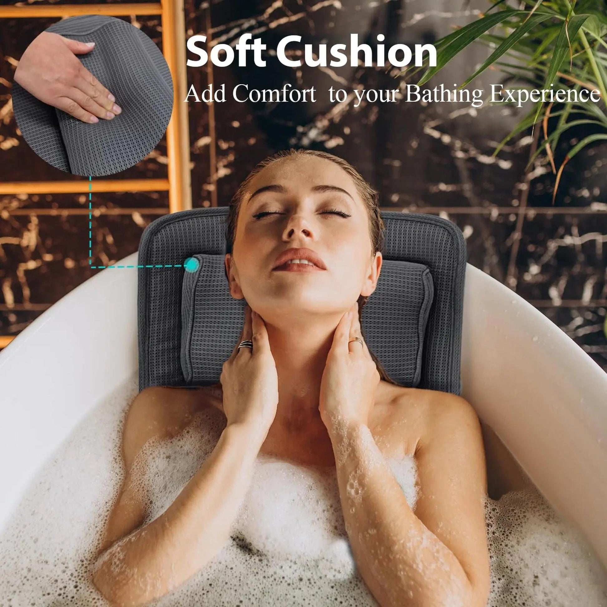 Woman relaxing in a bathtub with a grey mesh full body bath pillow supporting her head and neck.