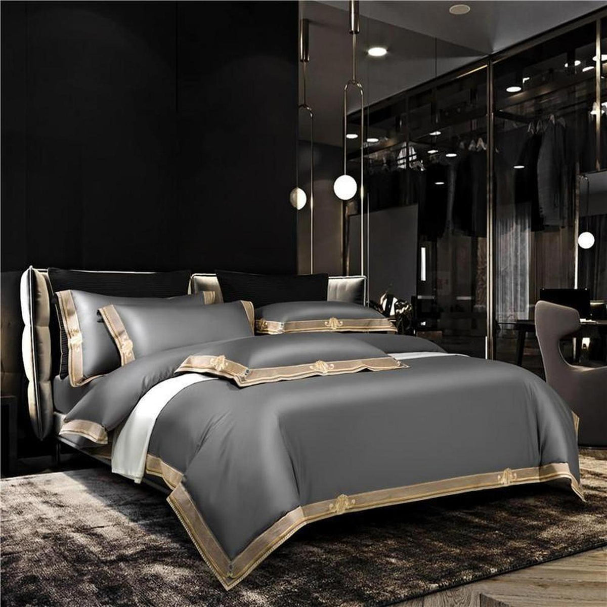 Luxury gray Egyptian cotton duvet cover set with elegant gold embroidery in a modern, high-end bedroom setting.