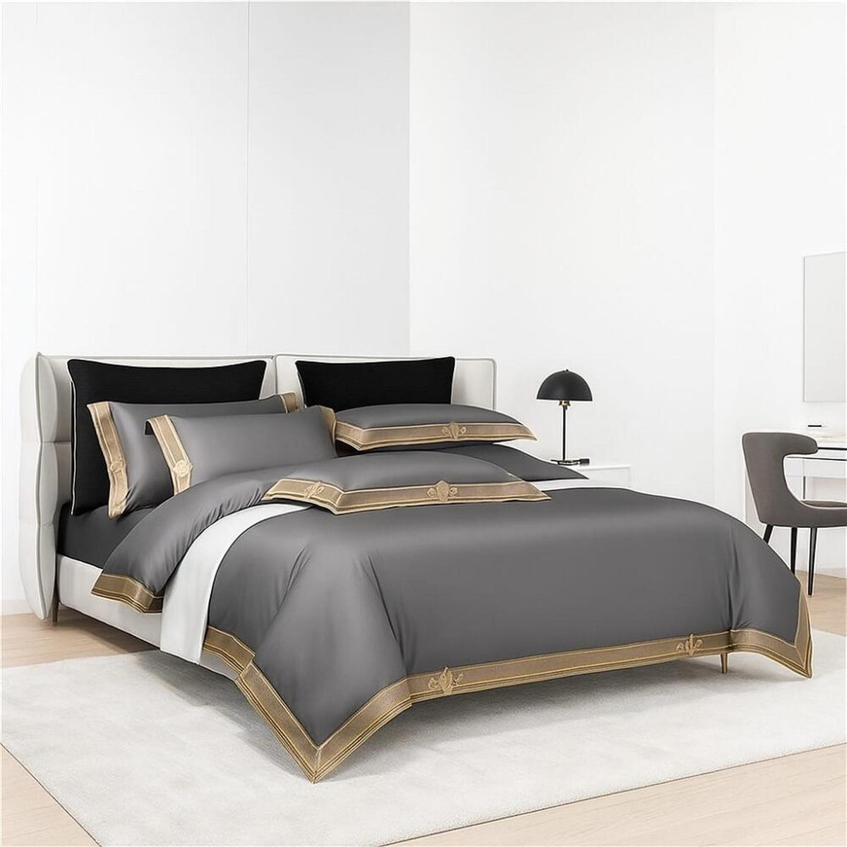 Luxury gray Egyptian cotton duvet cover set featuring elegant gold embroidery and matching pillow shams.
