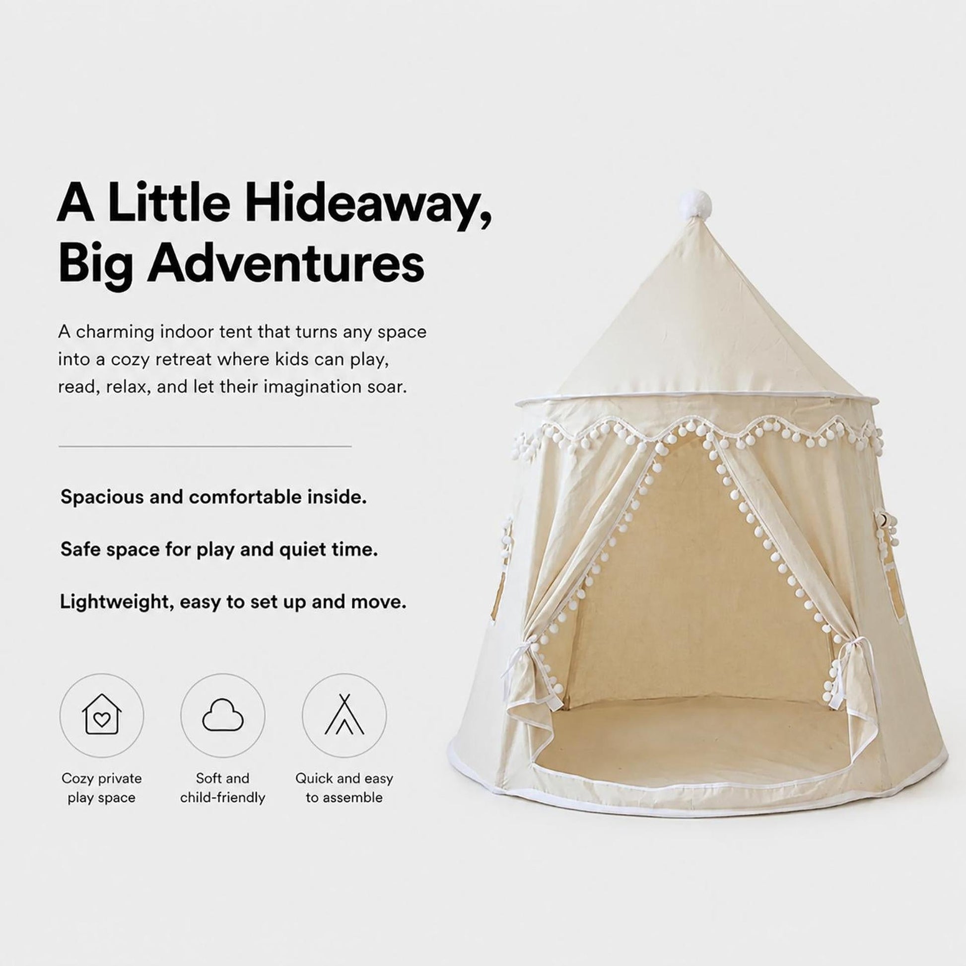 Cream fabric kids indoor play tent with white pom-pom trim and a pointed top, designed for imaginative play.