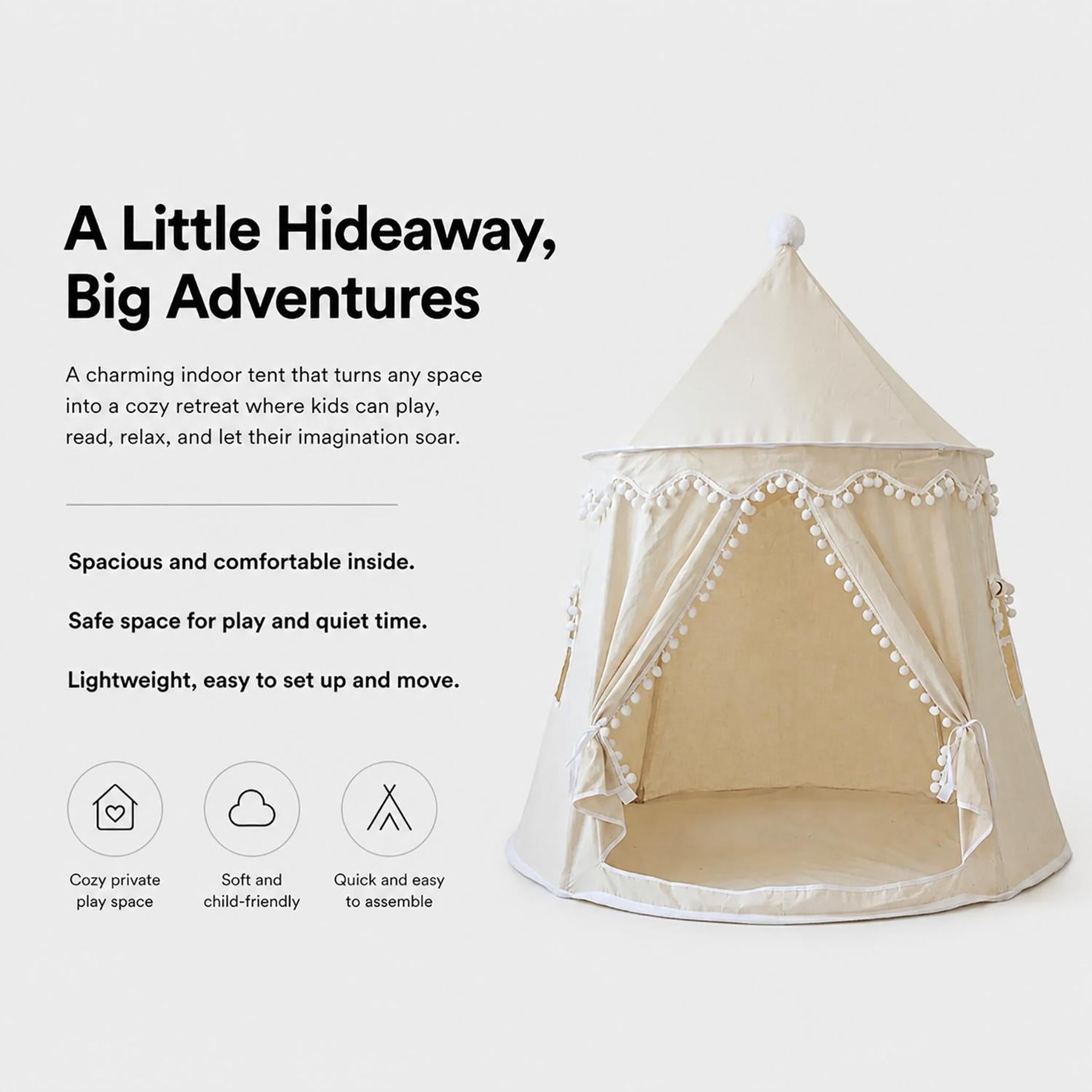 Cream fabric kids indoor play tent with white pom-pom trim and a pointed top, designed for imaginative play.