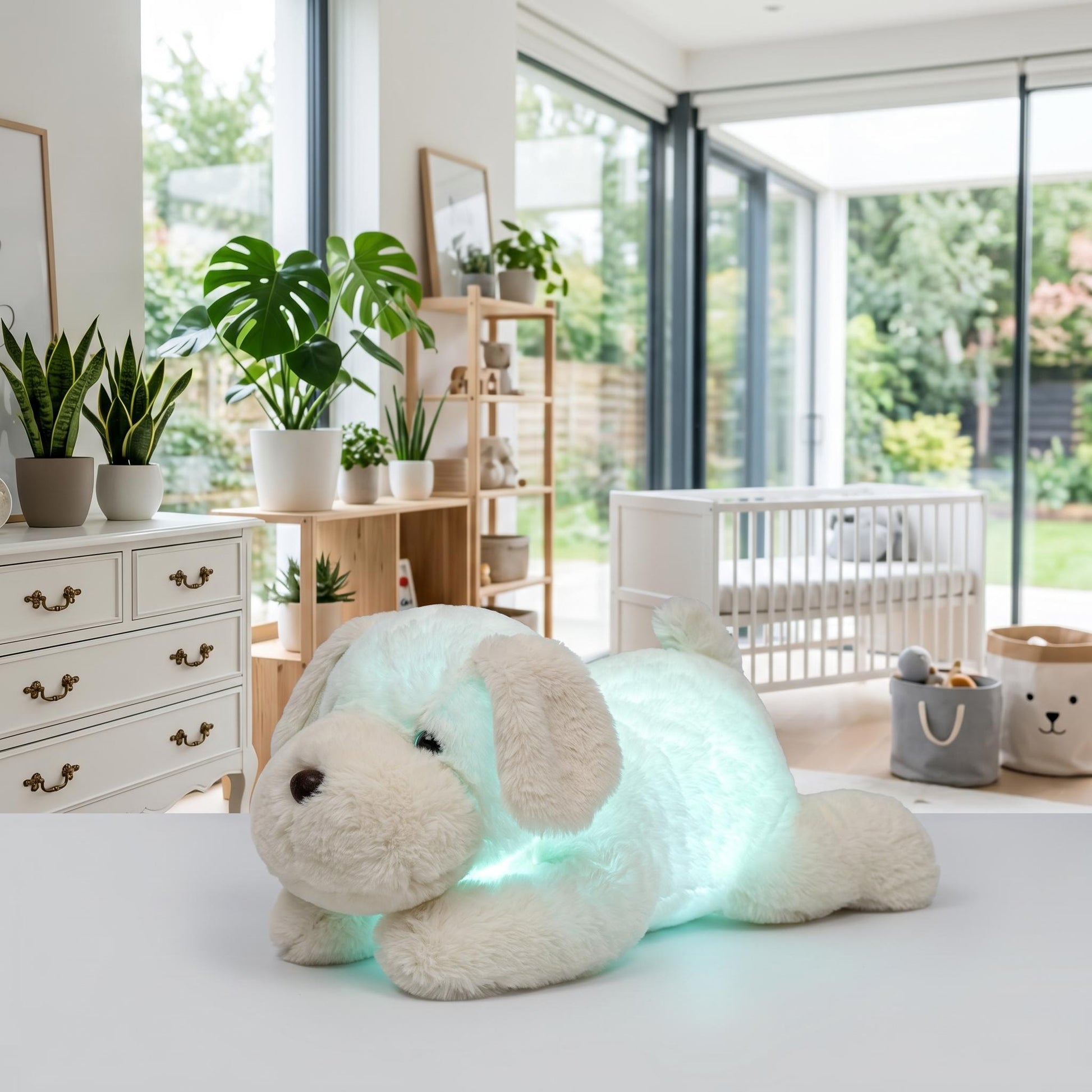 Luminous white dog plush pillow glowing with a soft green LED light in a bright, modern nursery.