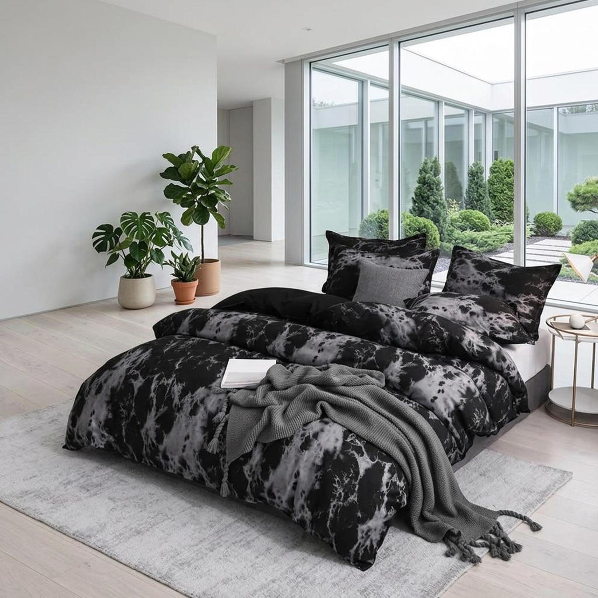 Dark marble print microfiber duvet cover set with shams on a bed in a modern bedroom.