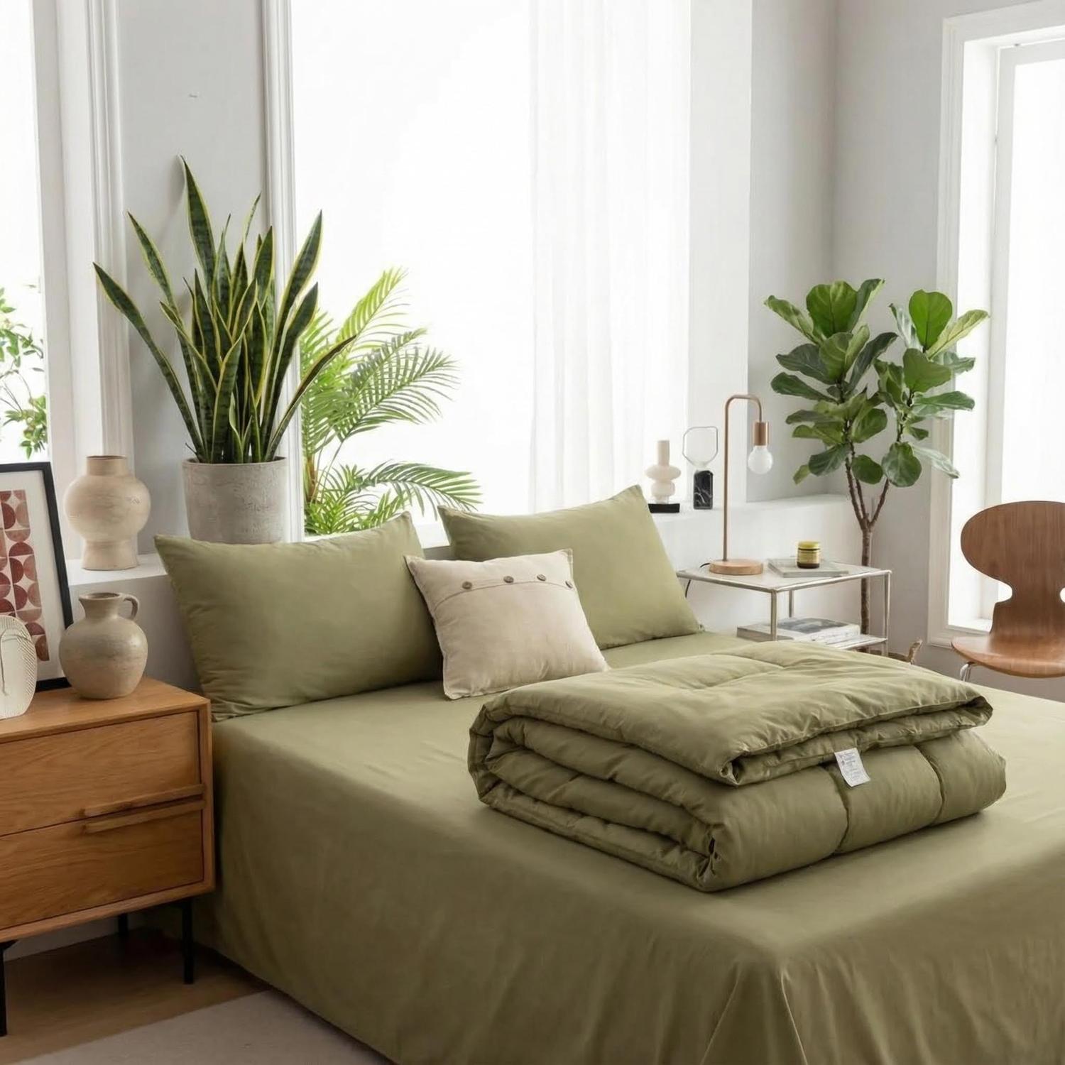 Olive green king comforter set with two matching pillowcases, showcasing a soft, bohemian style.