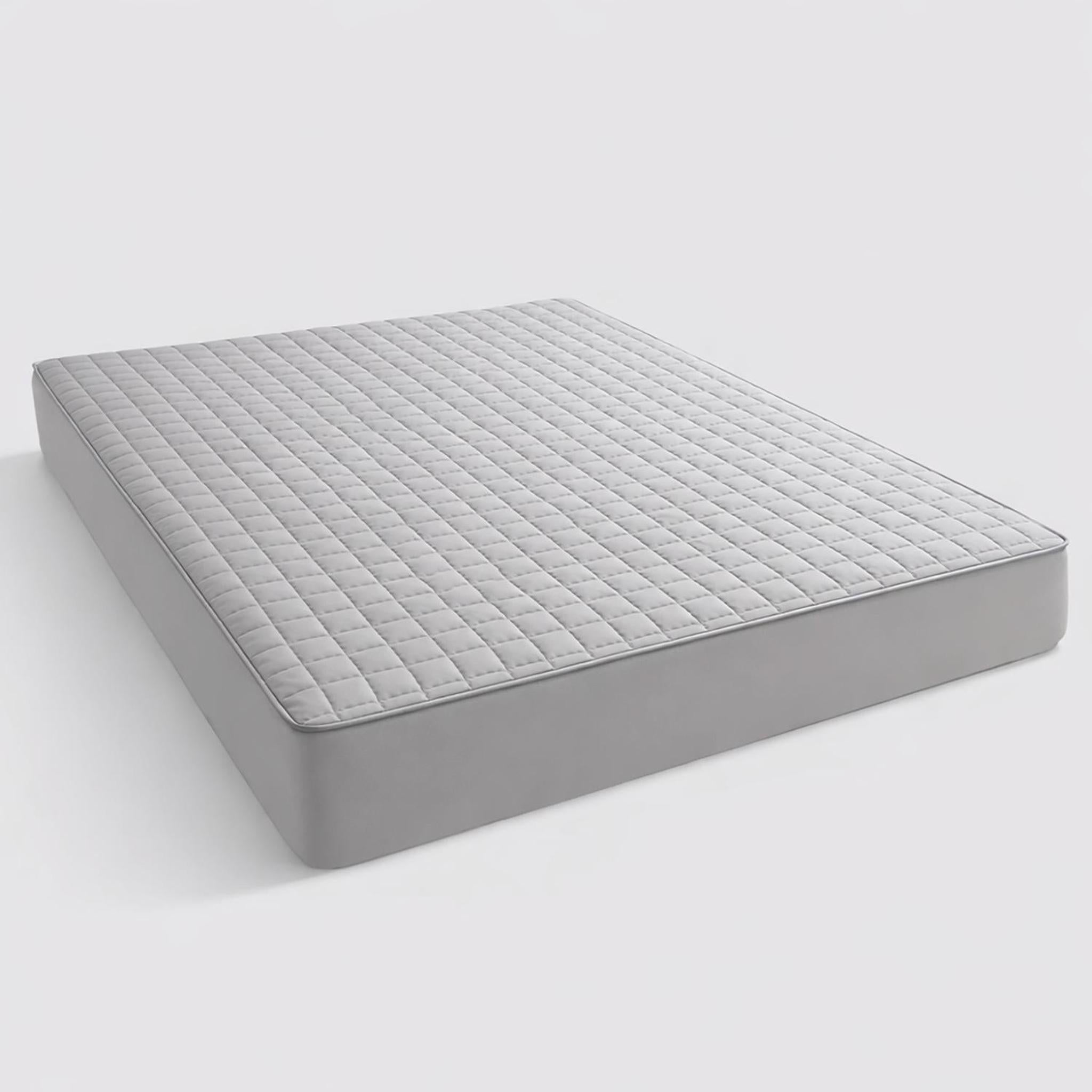 Light gray queen quilted mattress protector with a soft, smooth texture and fitted sheet design.