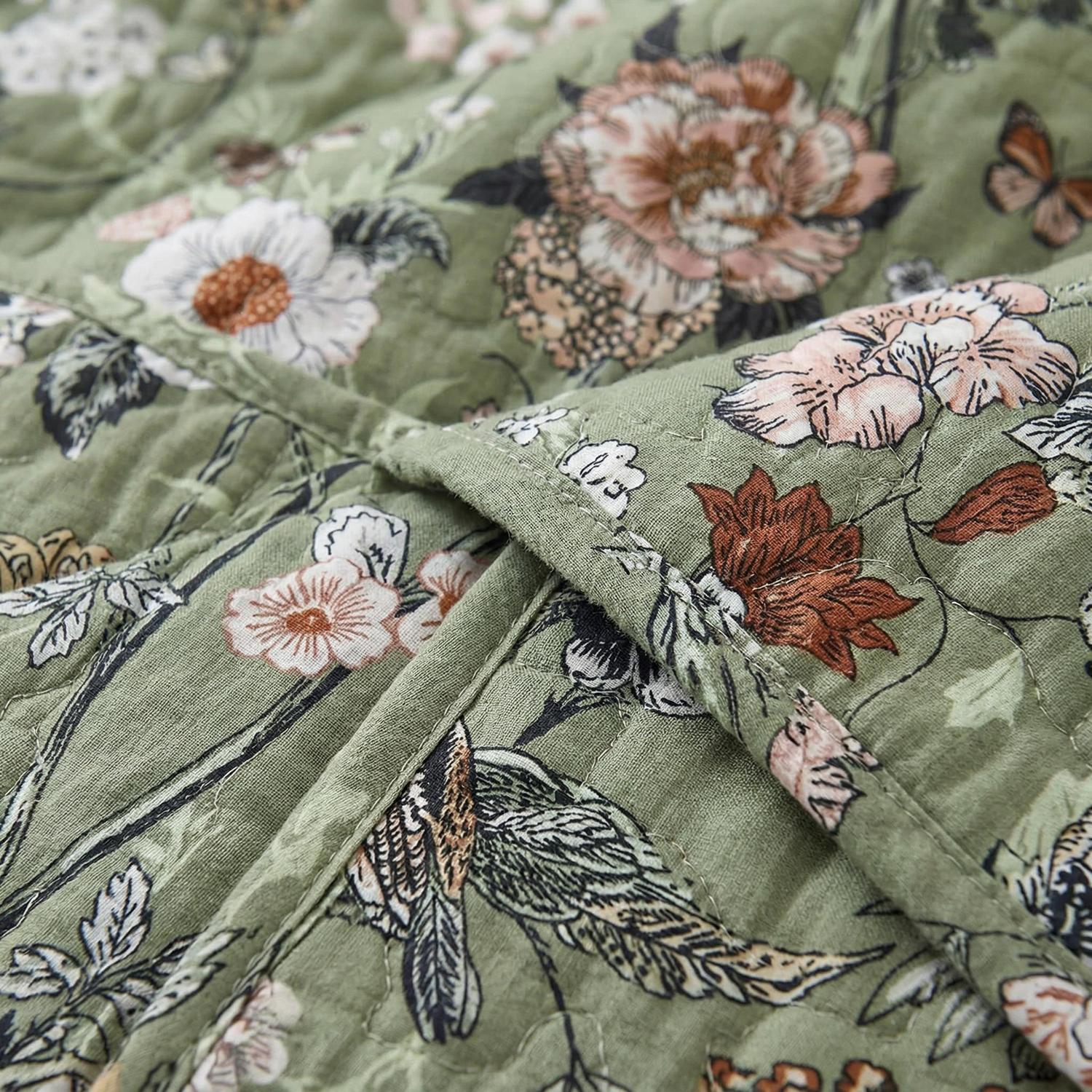 Rainforest floral printed quilt set in vibrant colors, made from soft microfiber, featuring elegant patterns.