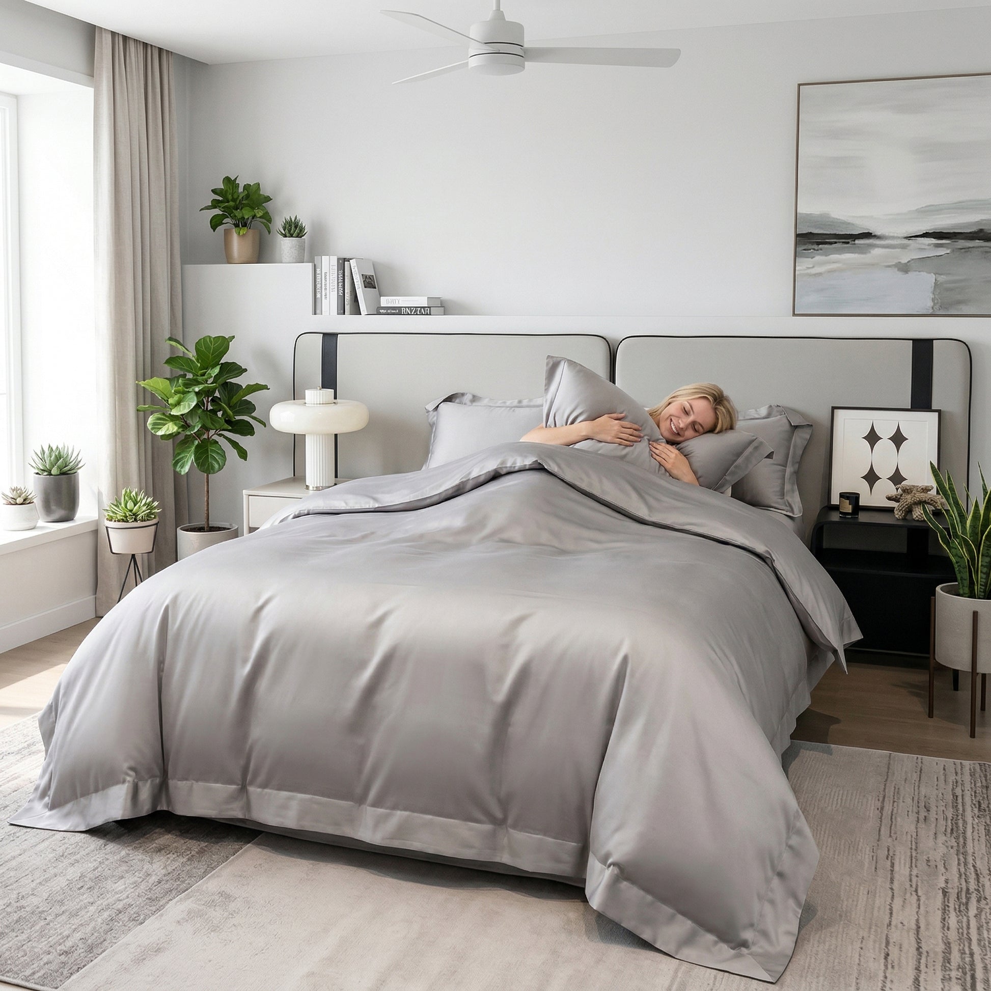 Elegant gray solid color cotton duvet cover bedding set on a bed with a smiling woman.