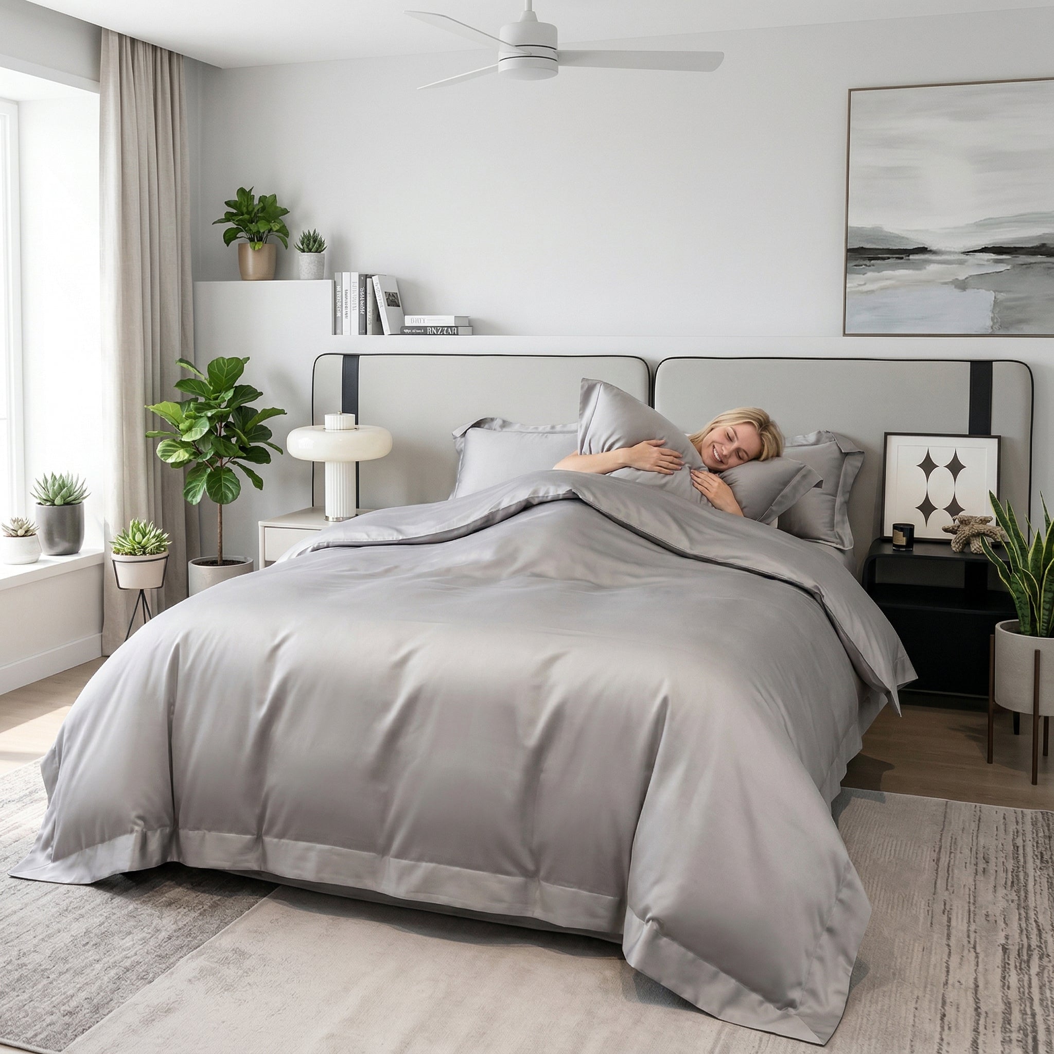 Elegant gray solid color cotton duvet cover bedding set on a bed with a smiling woman.