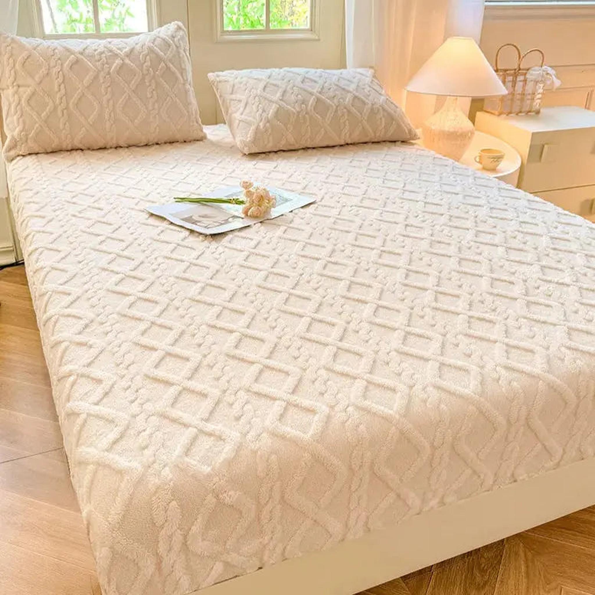 Cream coral fleece fitted bed sheet with a textured ribbed pattern and two matching pillowcases.
