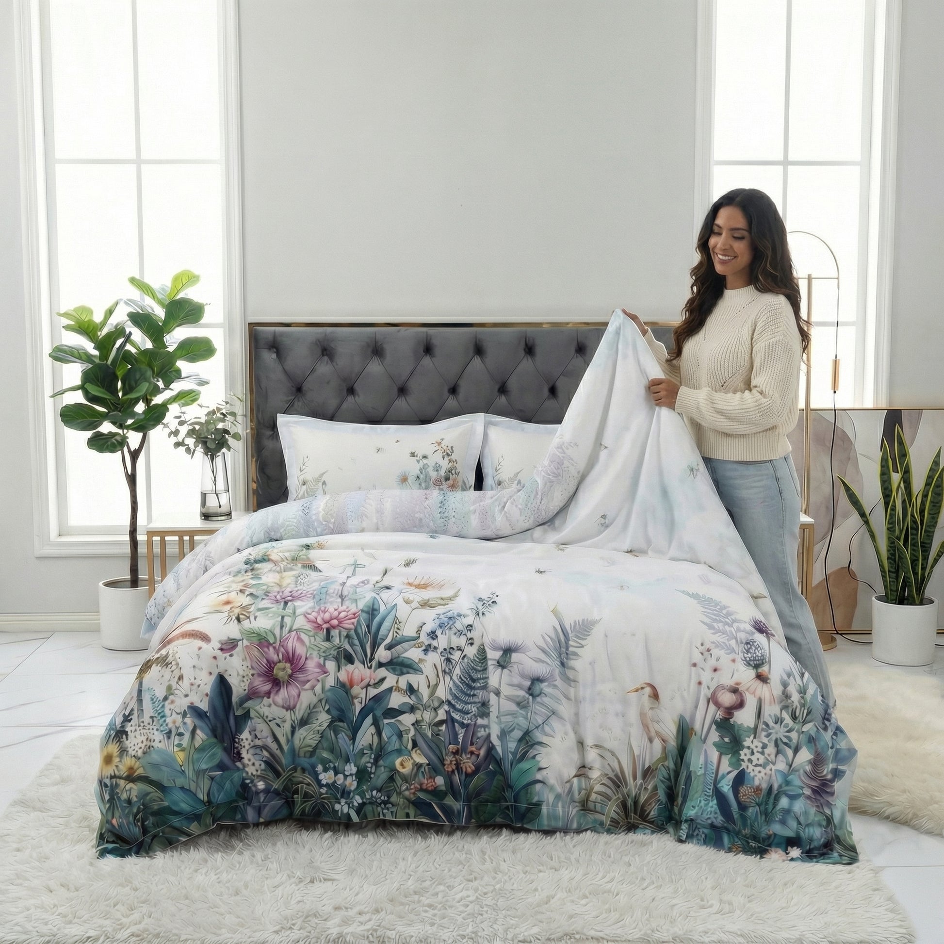 Violet floral cotton bedding set with duvet cover, bed sheet, and pillowcases on a bed.