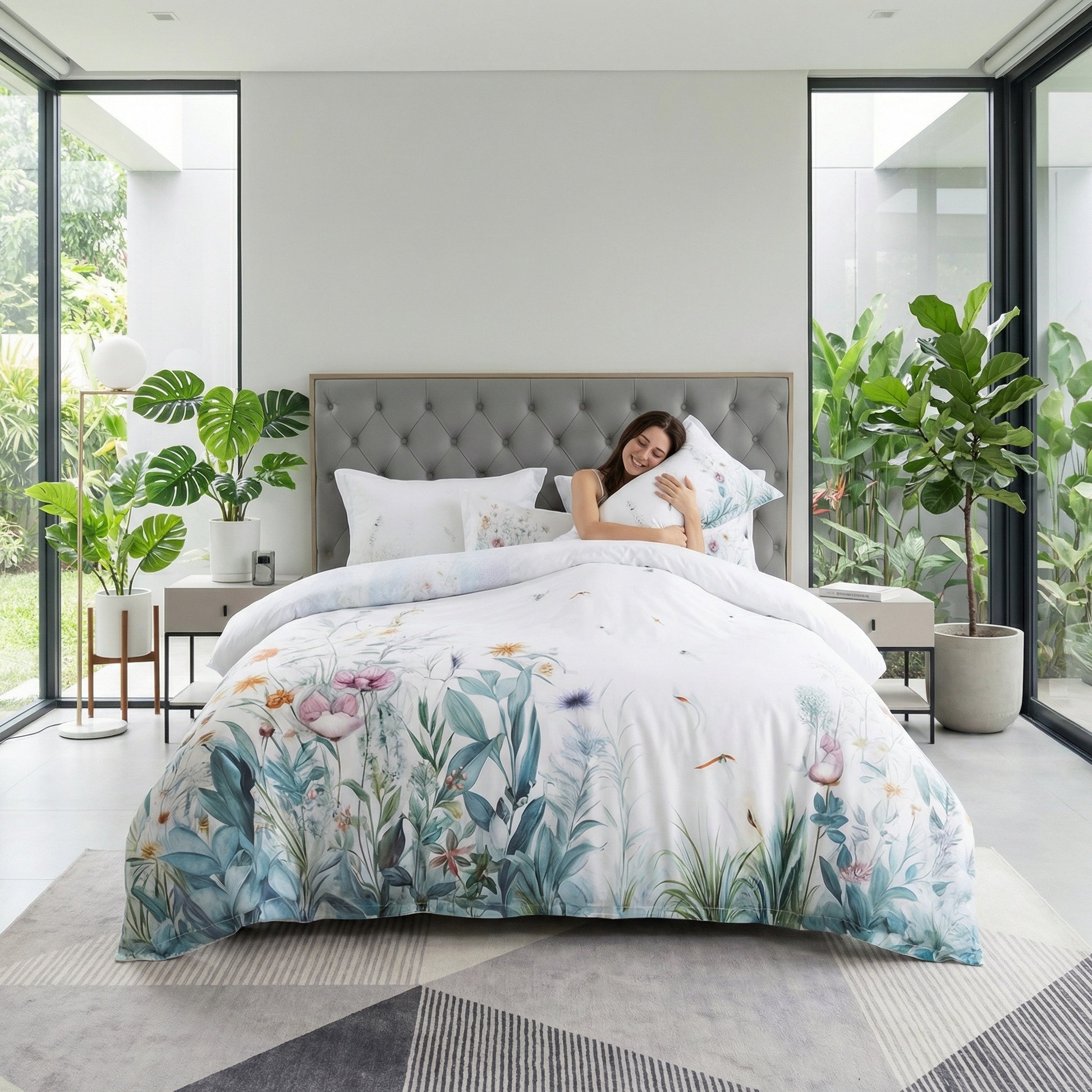 Queen Violet Floral Bedding Set with delicate floral pattern on misty grey, cotton, with woman.