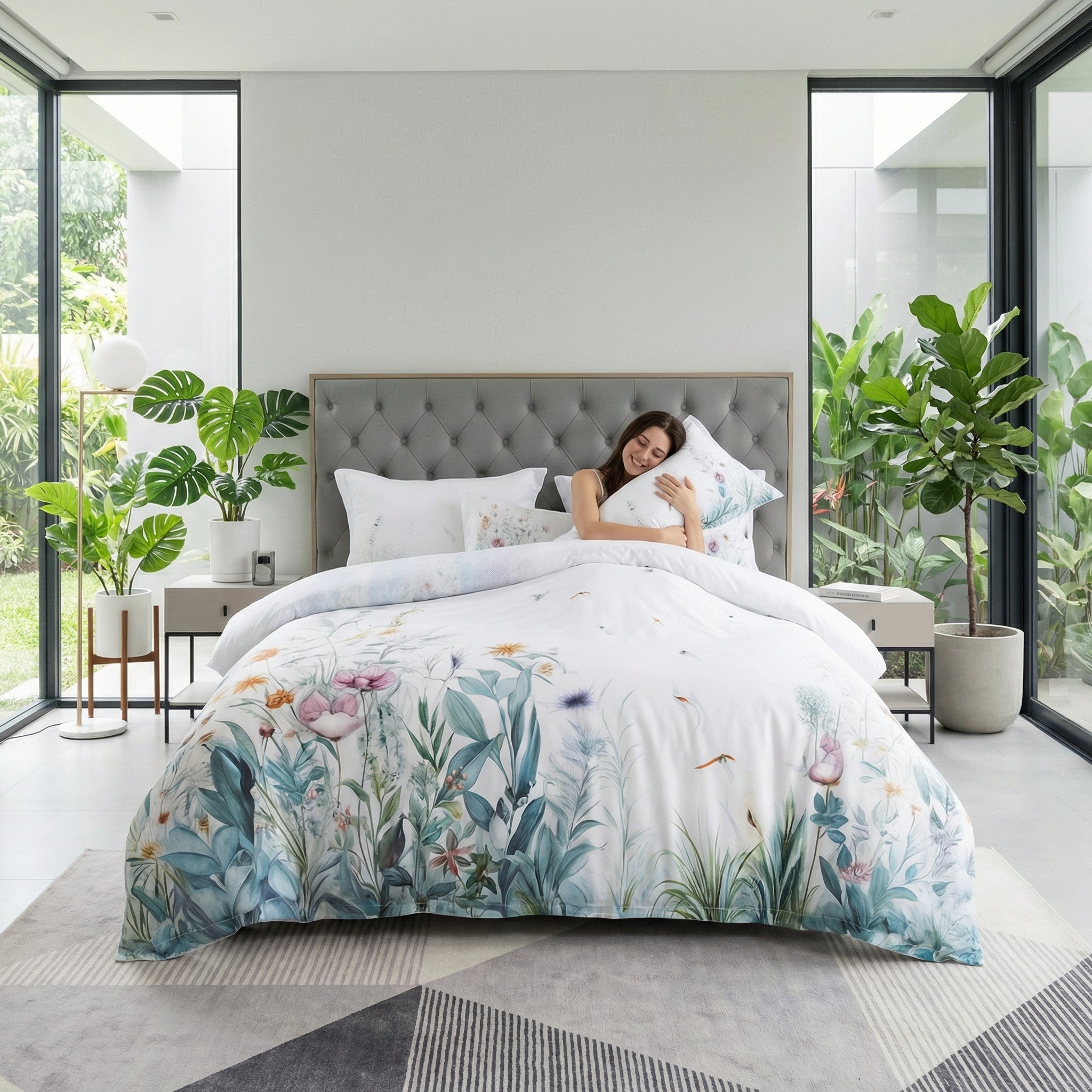 Queen Violet Floral Bedding Set with delicate floral pattern on misty grey, cotton, with woman.