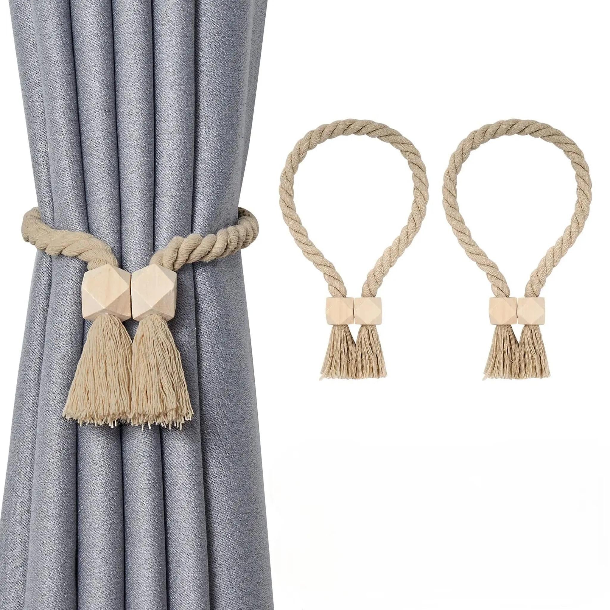 Magnetic cotton rope curtain tiebacks with wooden beads and tassels on a grey curtain.