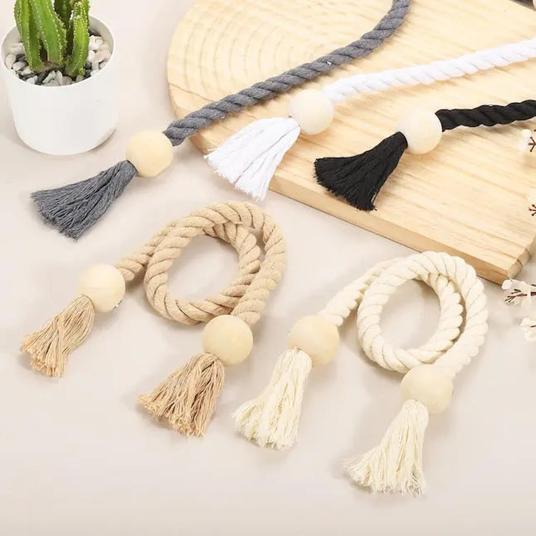 Magnetic cotton rope curtain tiebacks with wooden beads and tassels in various colors.